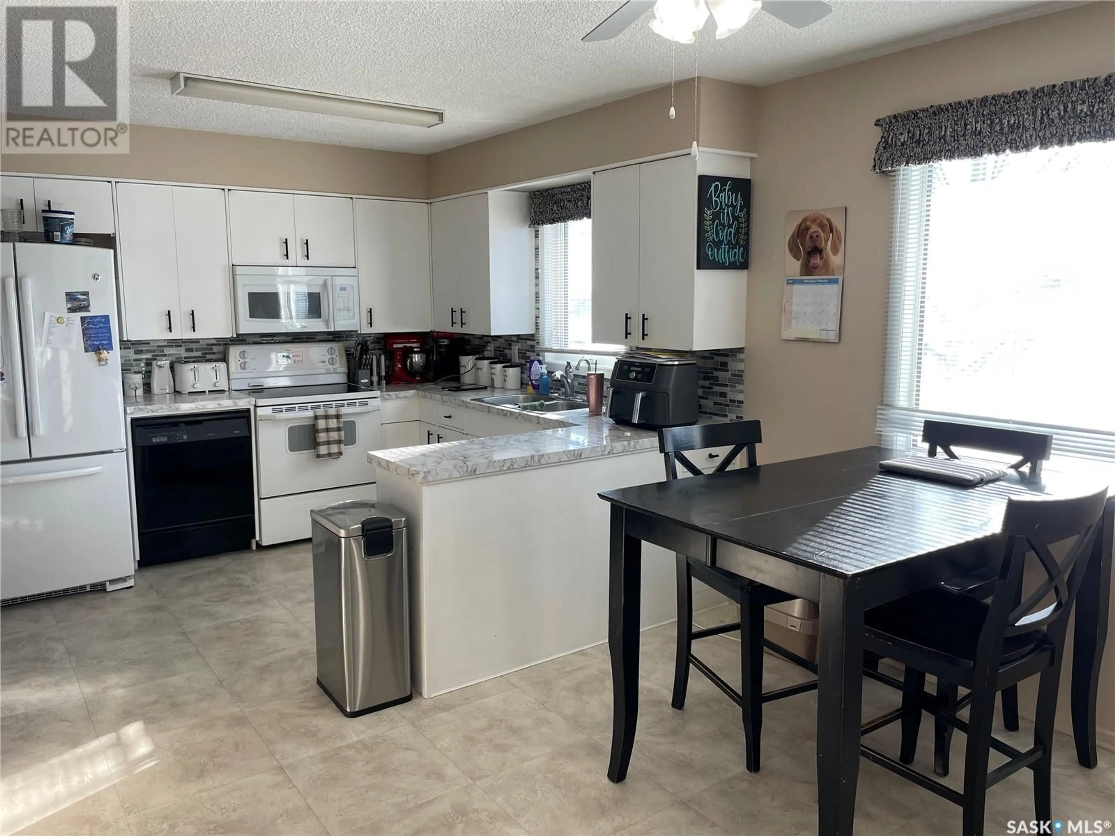 Open concept kitchen, unknown for 300 Railway AVENUE, Codette Saskatchewan S0E0P0