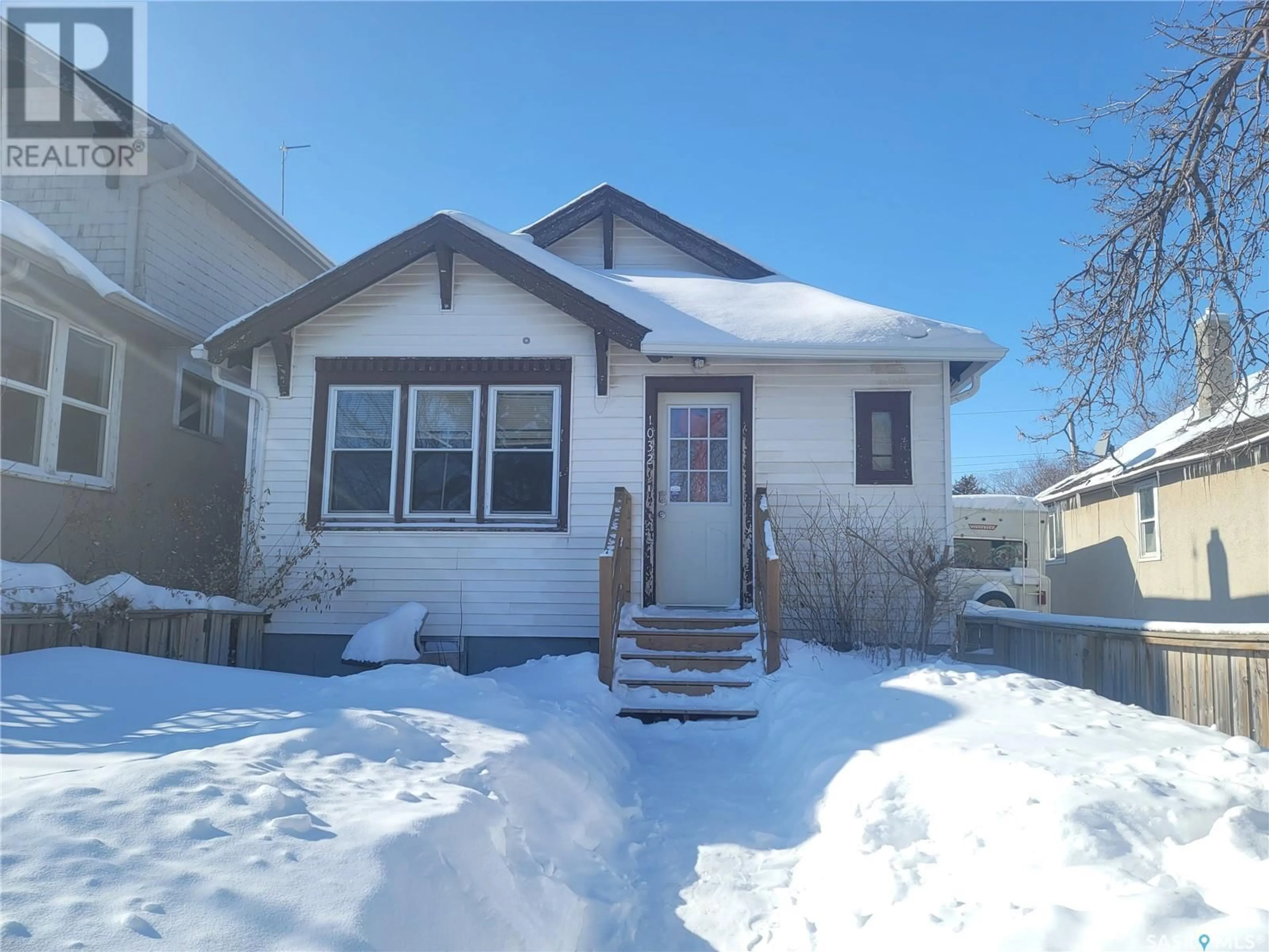 Home with vinyl exterior material, street for 1032 RETALLACK STREET, Regina Saskatchewan S4T2H3