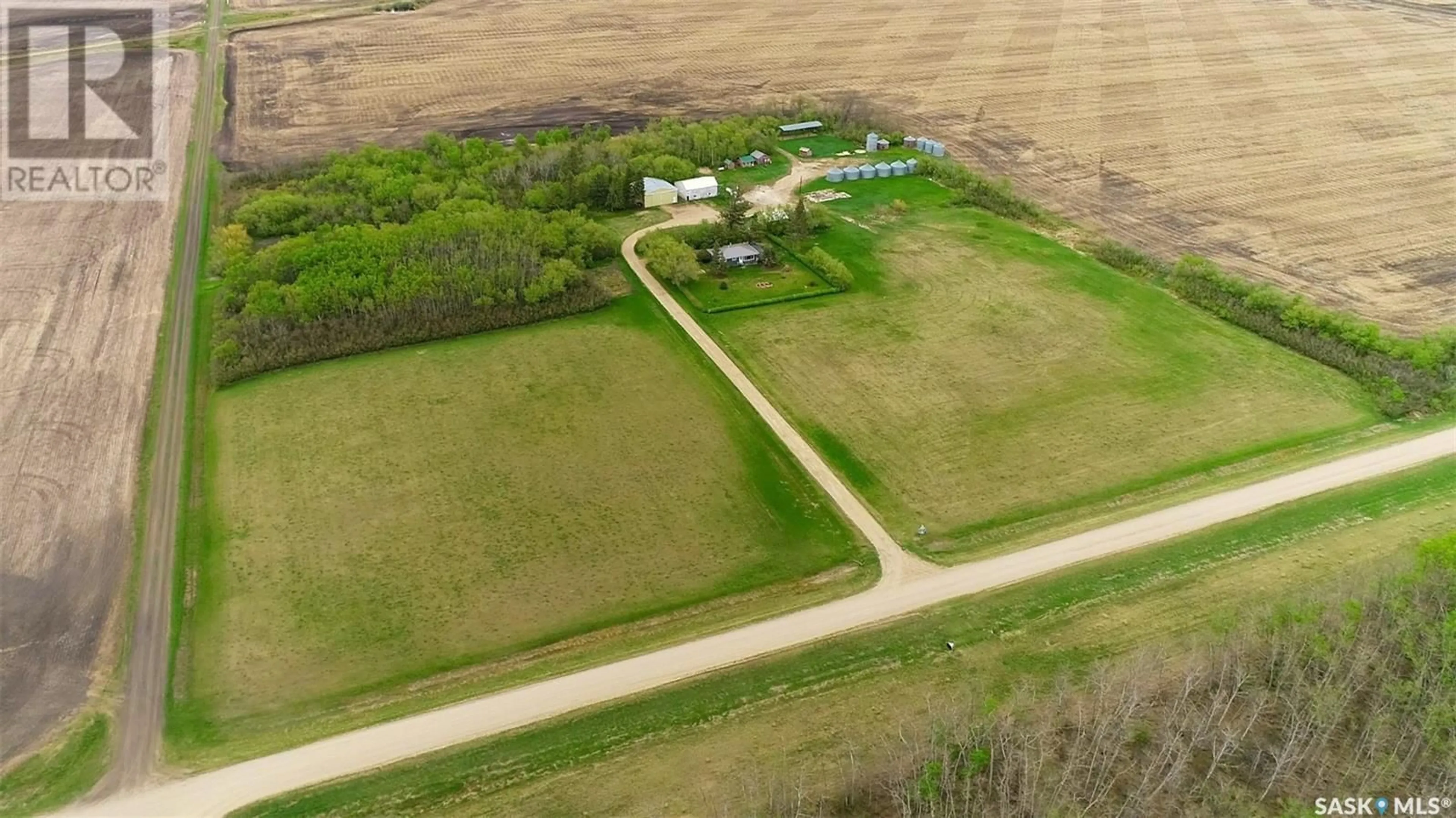 A pic from outside/outdoor area/front of a property/back of a property/a pic from drone, street for 19.32 BROOKSBY ACREAGE, Willow Creek Rm No. 458 Saskatchewan S0E0H0