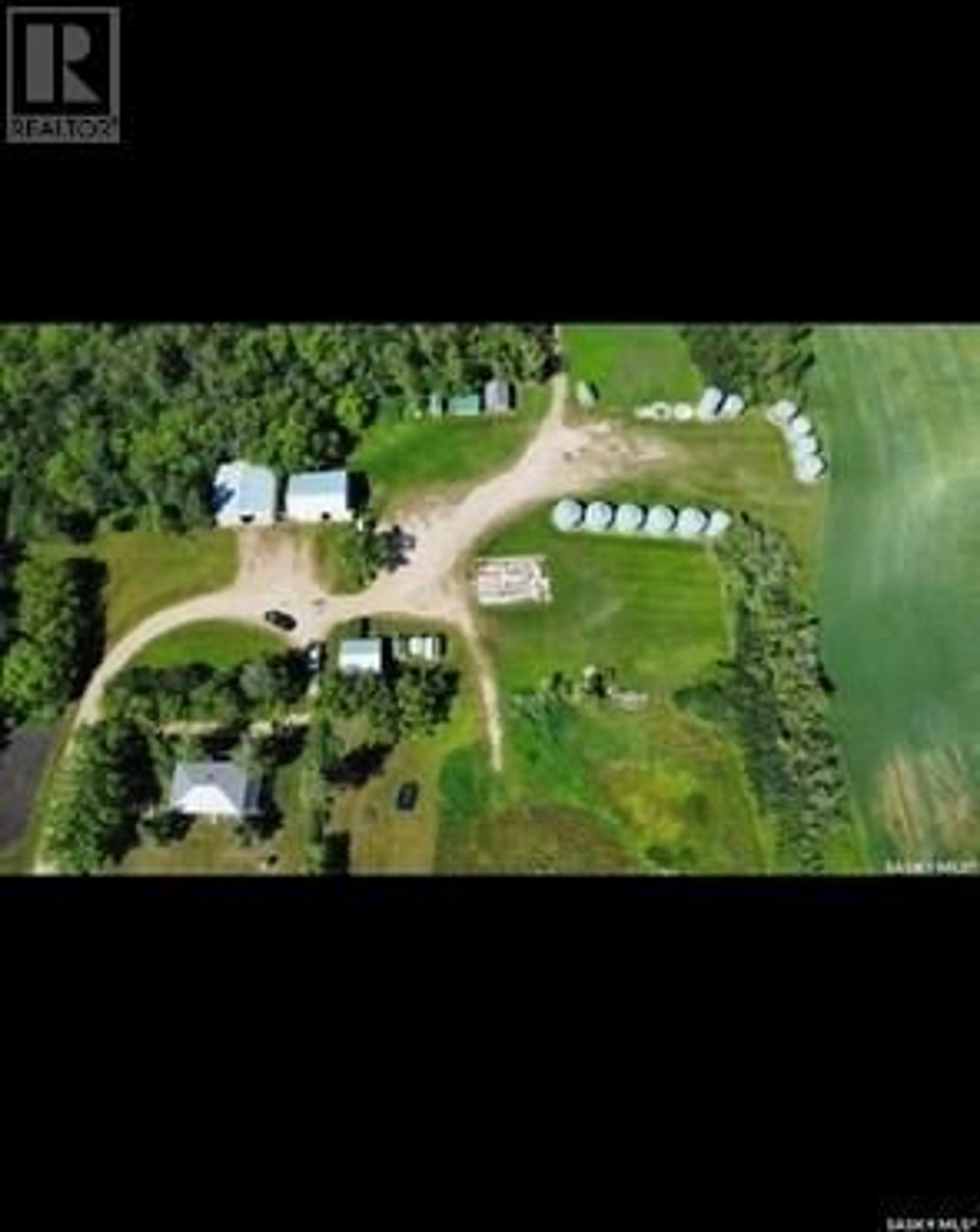 A pic from outside/outdoor area/front of a property/back of a property/a pic from drone, unknown for Brooksby Acreage 19.32 Acres, Willow Creek Rm No. 458 Saskatchewan S0E0H0