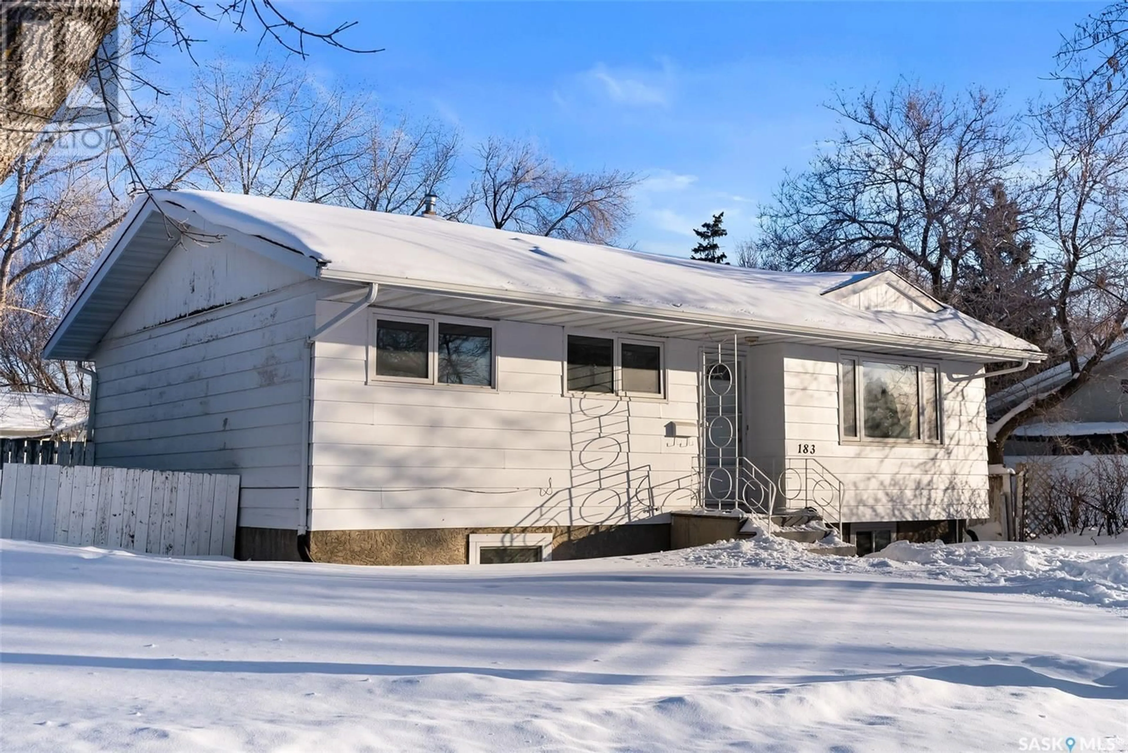 Home with vinyl exterior material, street for 183 Magee CRESCENT, Regina Saskatchewan S4R6K6