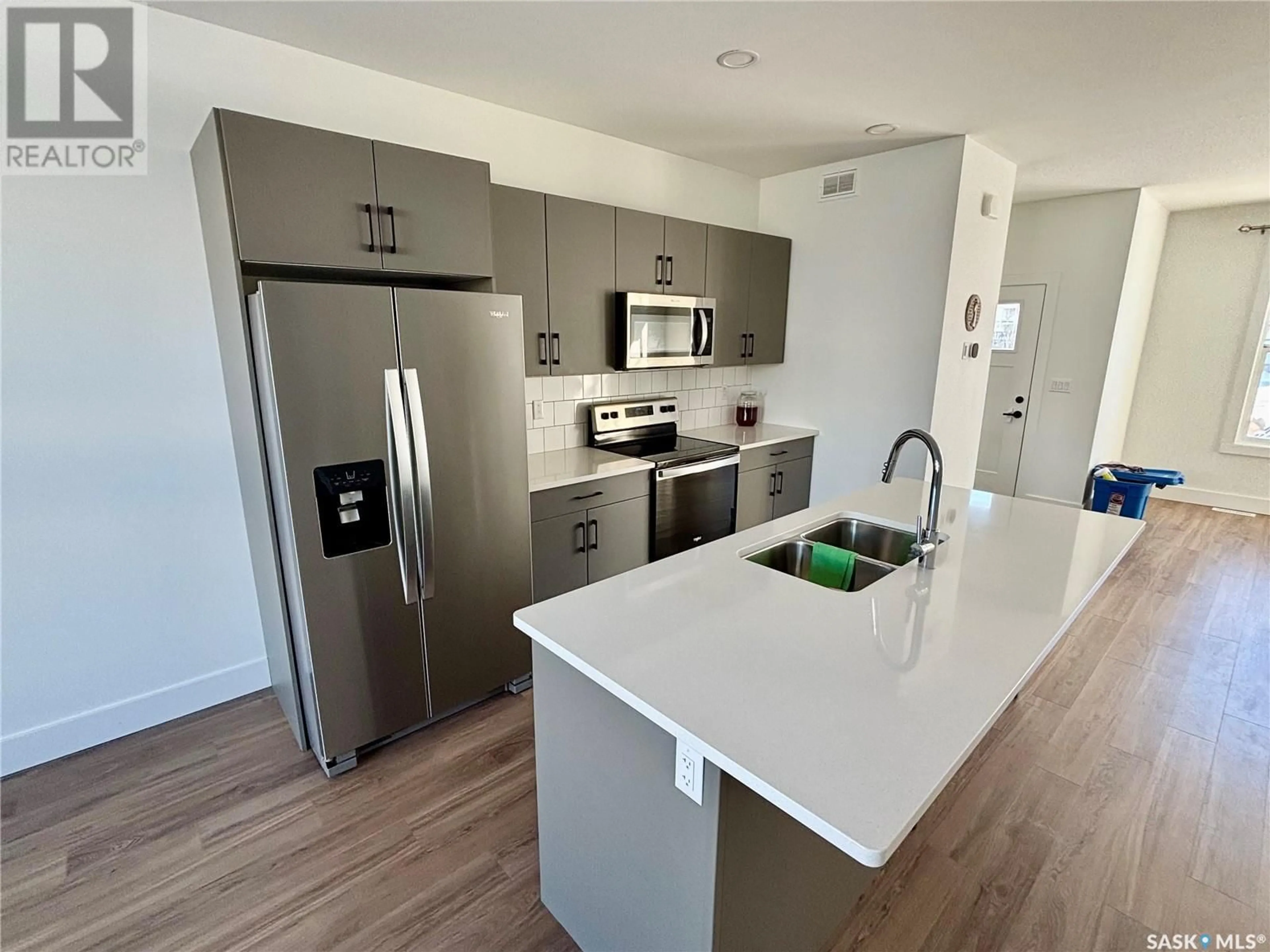 Open concept kitchen, unknown for 135 Rosewood BOULEVARD E, Saskatoon Saskatchewan S7V0X2