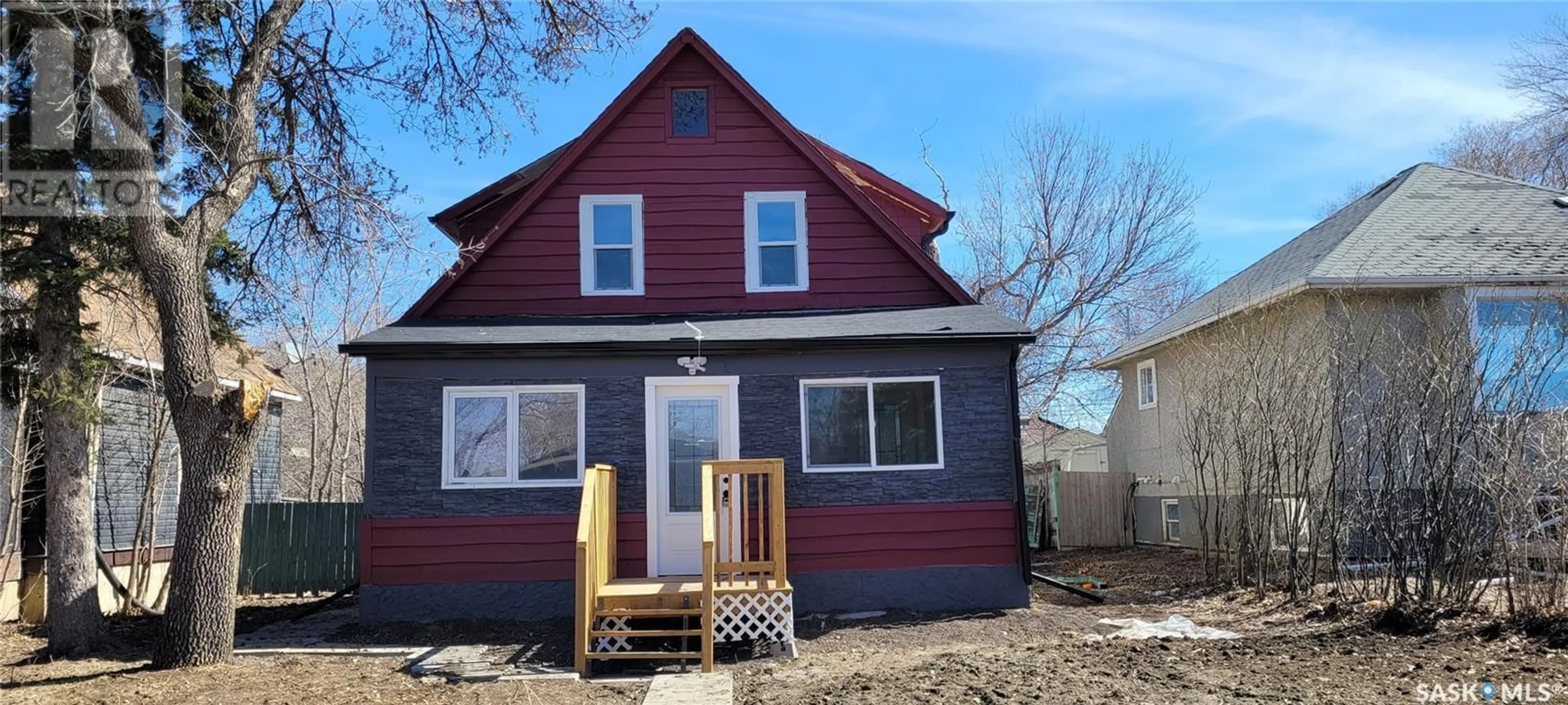 Home with vinyl exterior material, street for 949 Elliott STREET, Regina Saskatchewan S4N3E5