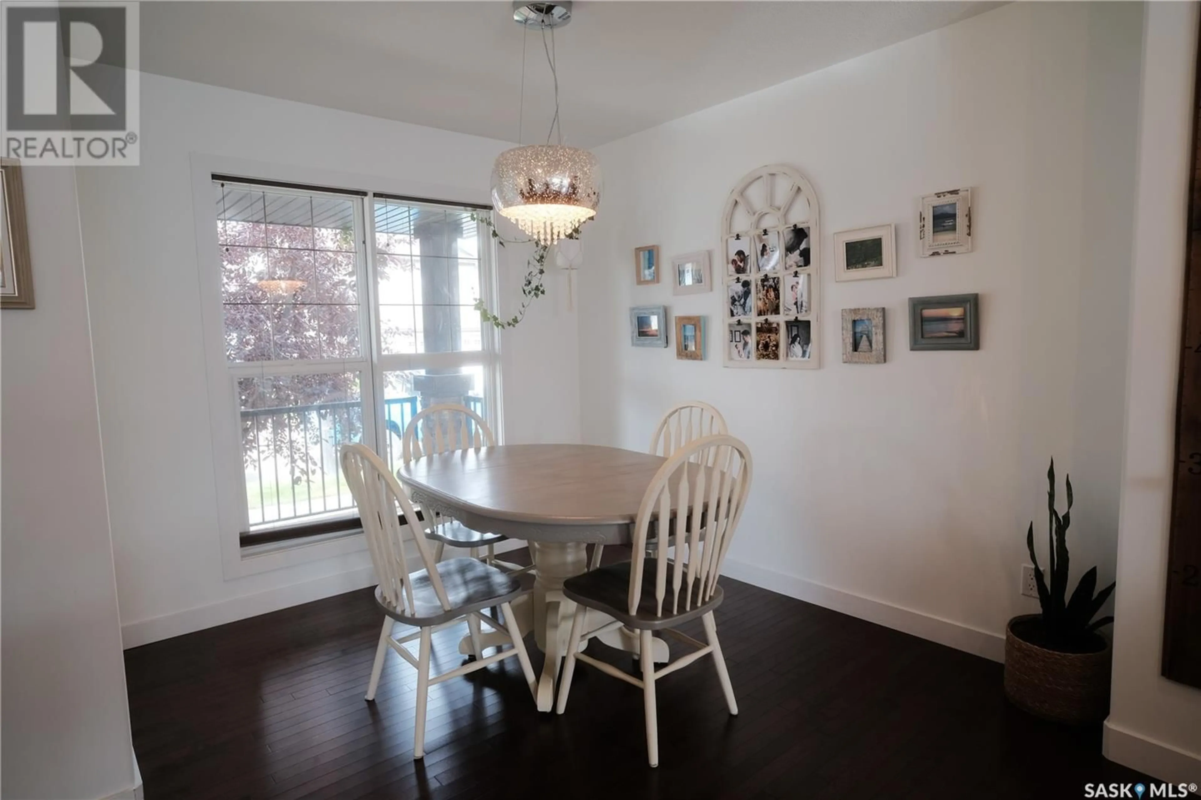 Dining room, wood/laminate floor for 3664 Green Moss LANE, Regina Saskatchewan S4V1M2