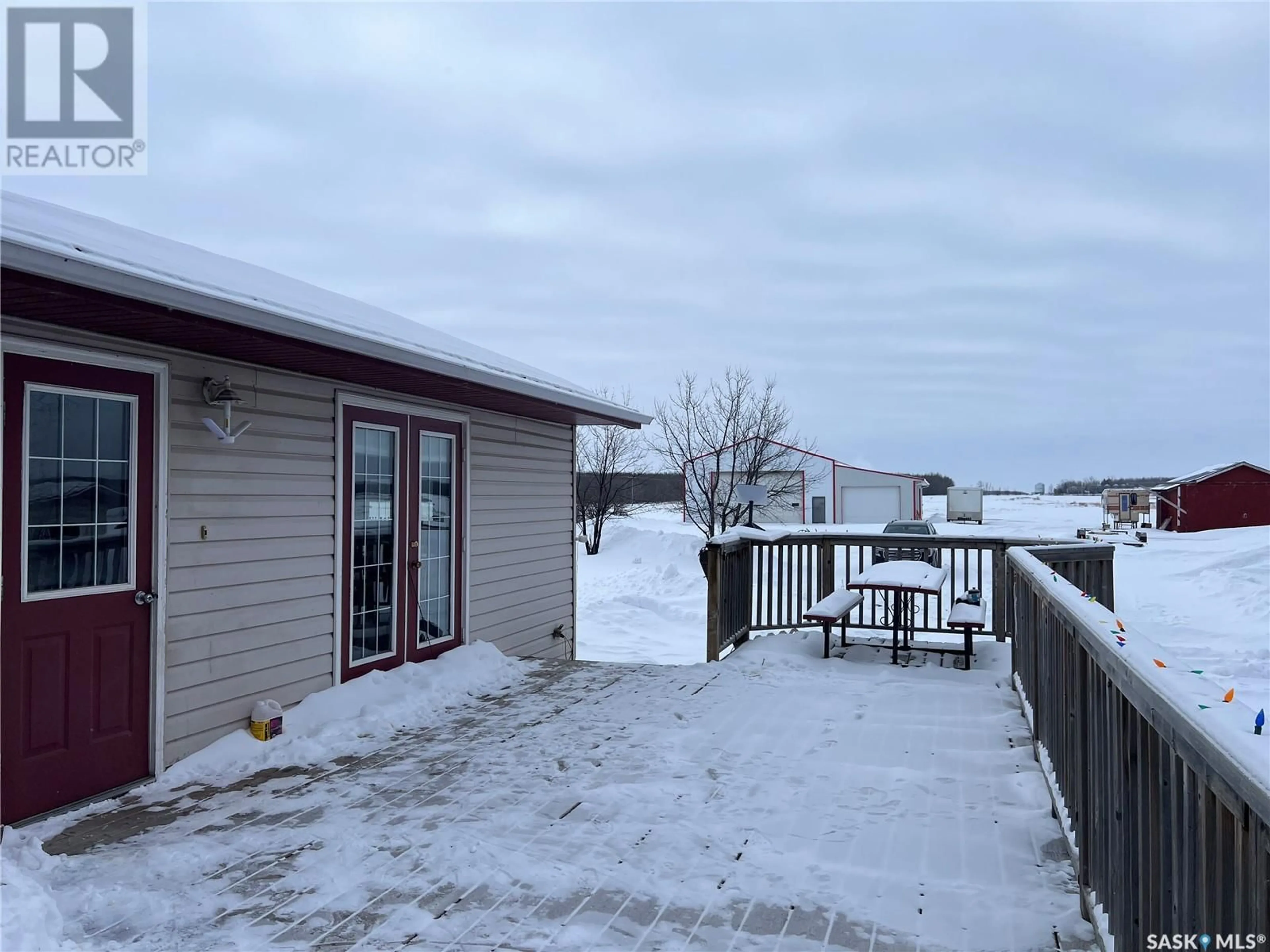 A pic from outside/outdoor area/front of a property/back of a property/a pic from drone, water/lake/river/ocean view for 4KM South of Loon Lake, Loon Lake Saskatchewan S0M1L0