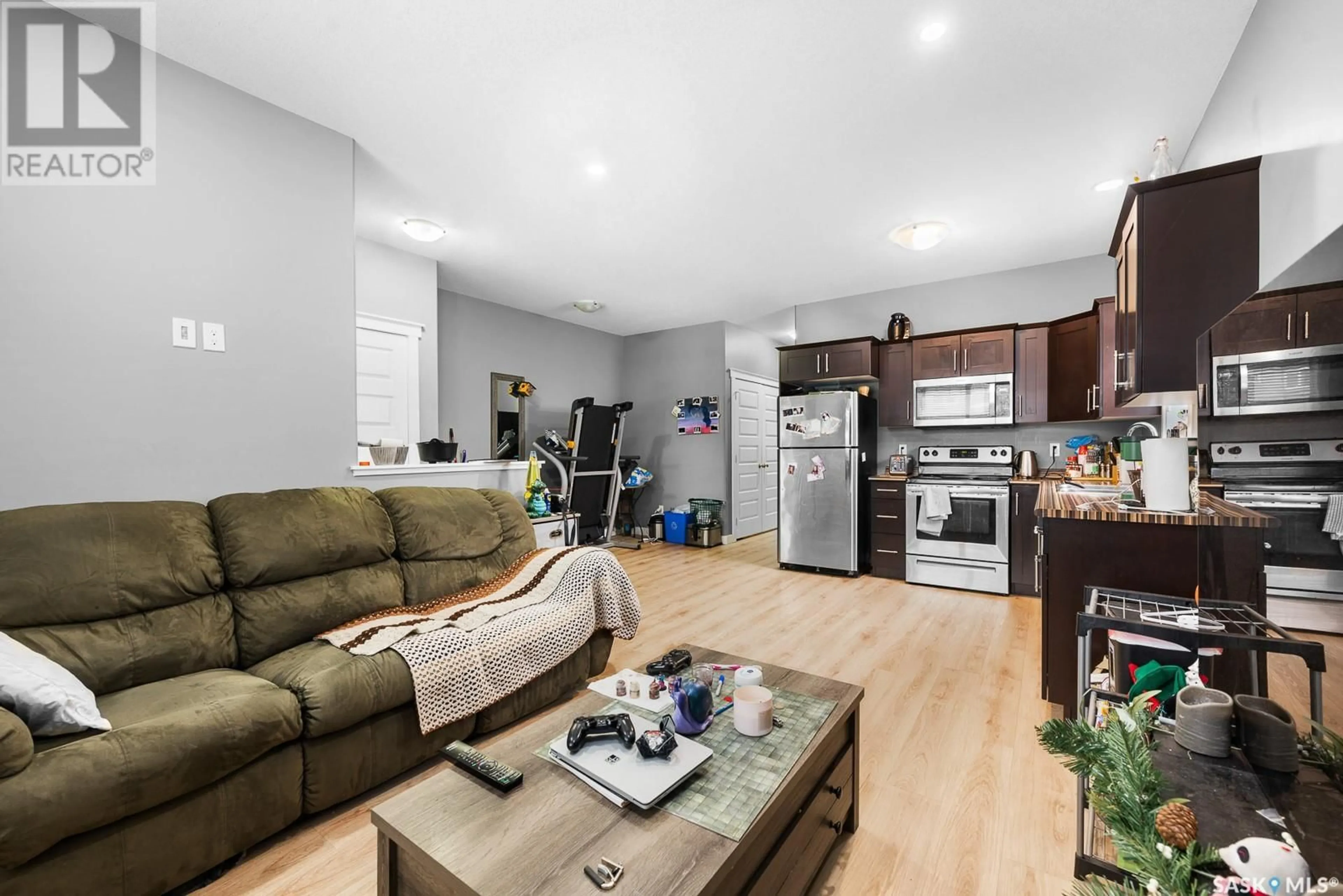 Open concept kitchen, wood/laminate floor for 2650 LACON STREET, Regina Saskatchewan S4N2A6