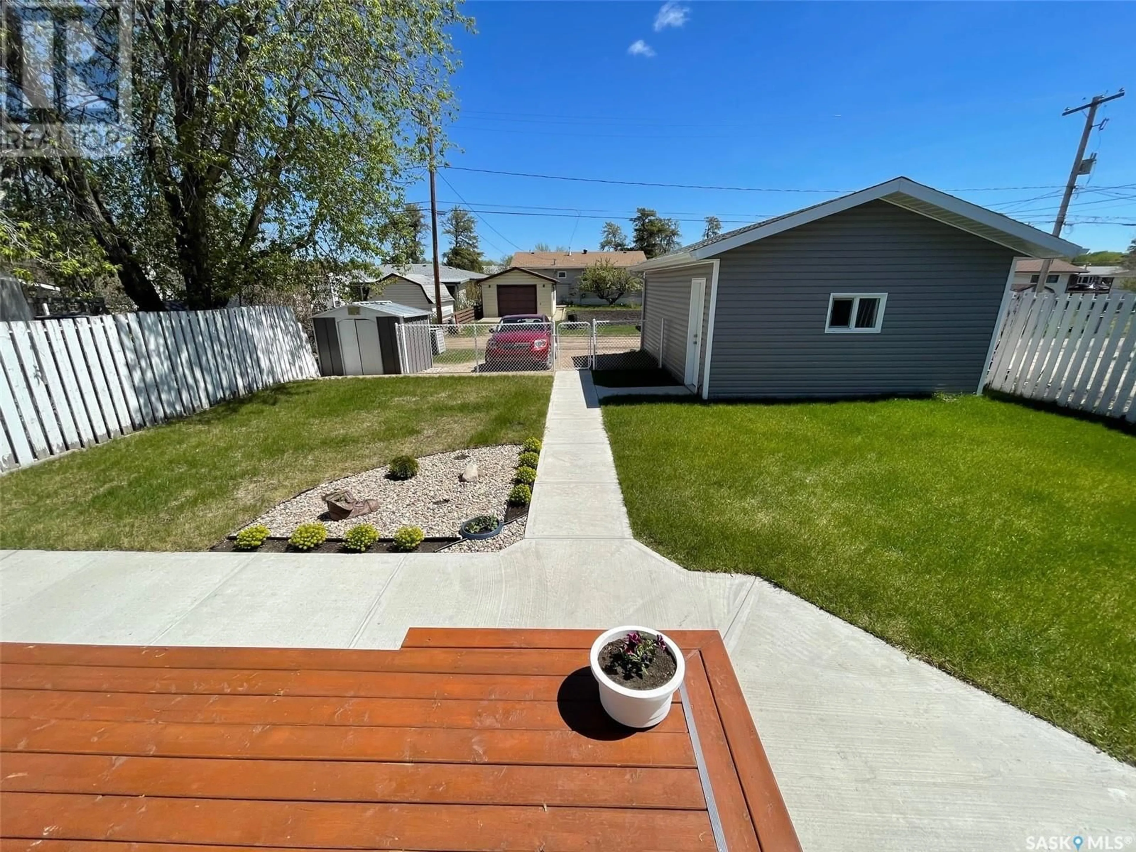 A pic from outside/outdoor area/front of a property/back of a property/a pic from drone, street for 704 Prince STREET, Hudson Bay Saskatchewan S0E0Y0