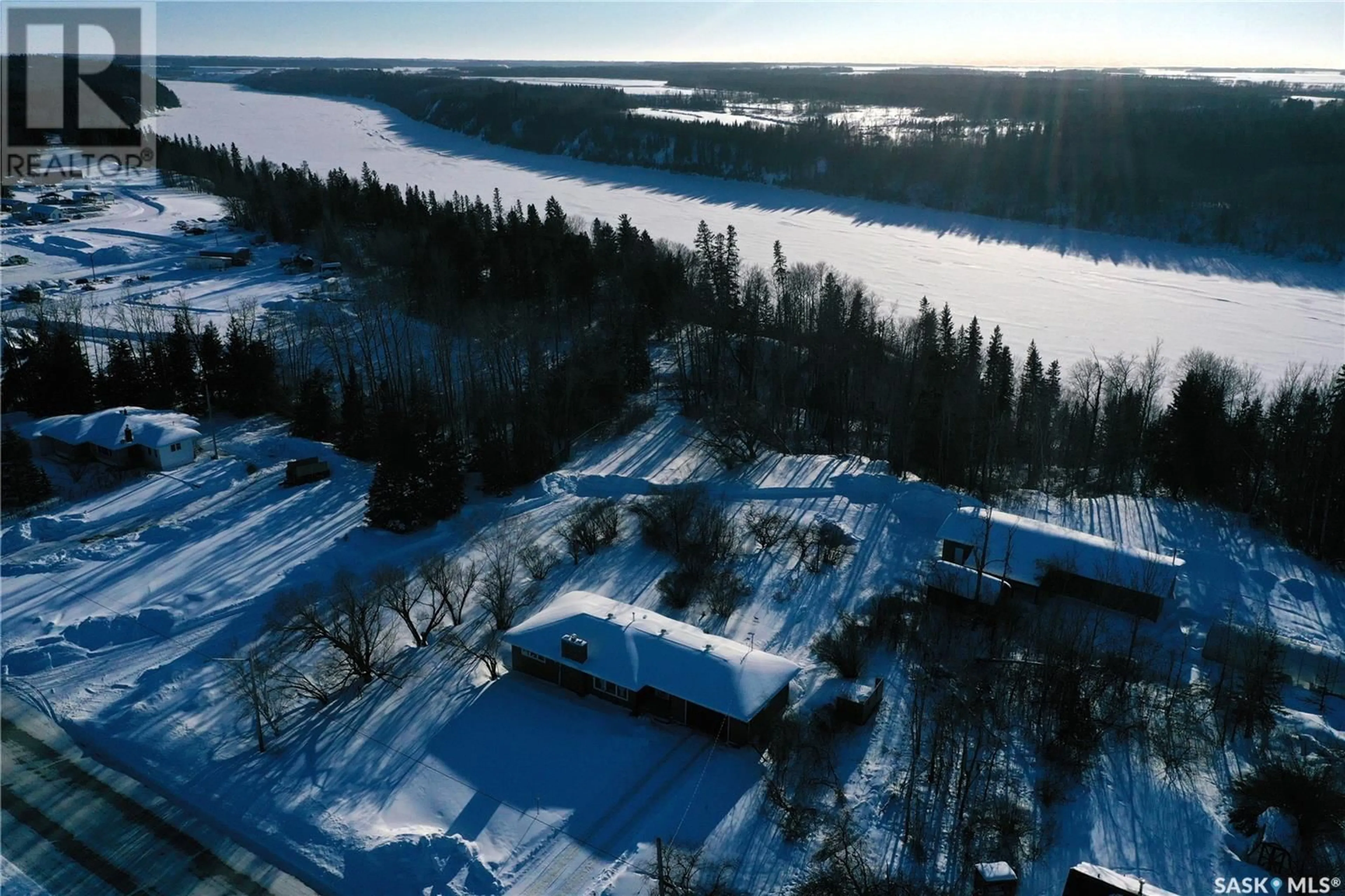 A pic from outside/outdoor area/front of a property/back of a property/a pic from drone, water/lake/river/ocean view for Lacheur Acreage, Nipawin Saskatchewan S0E1E0