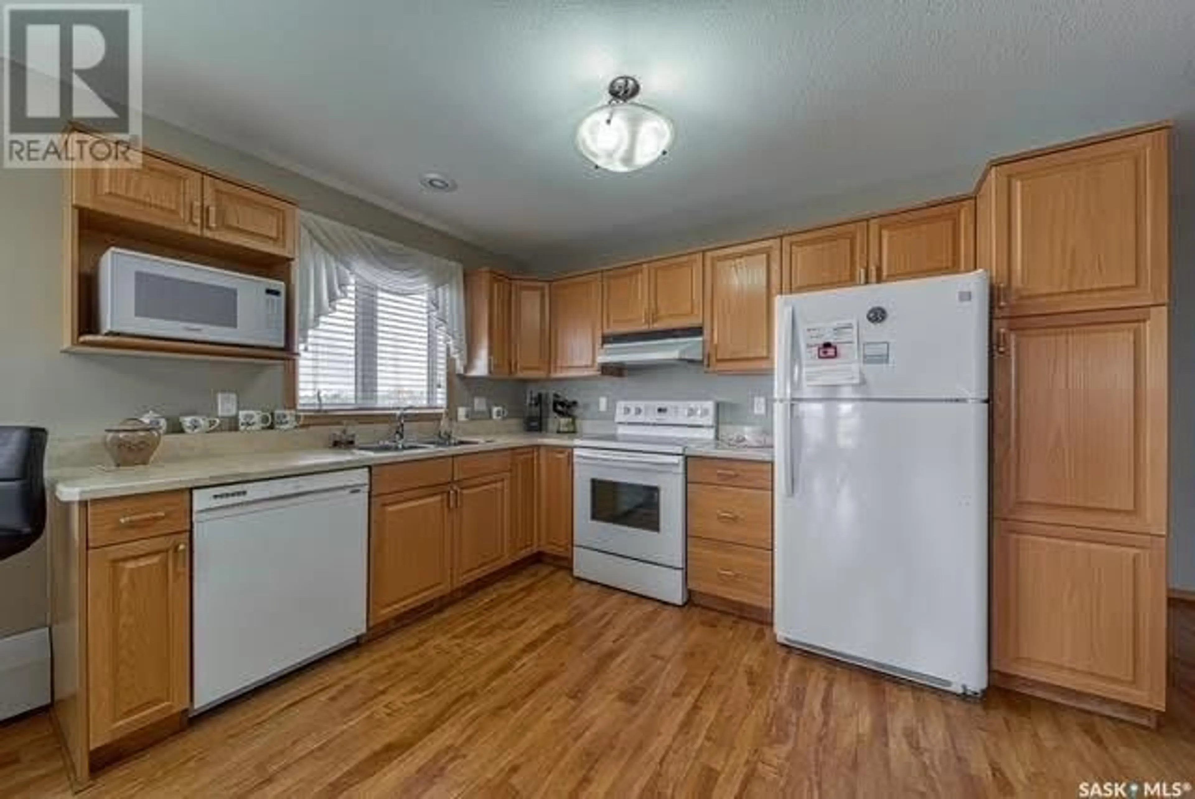 Standard kitchen, wood/laminate floor for 401 205 McIntyre STREET N, Regina Saskatchewan S4R3B7