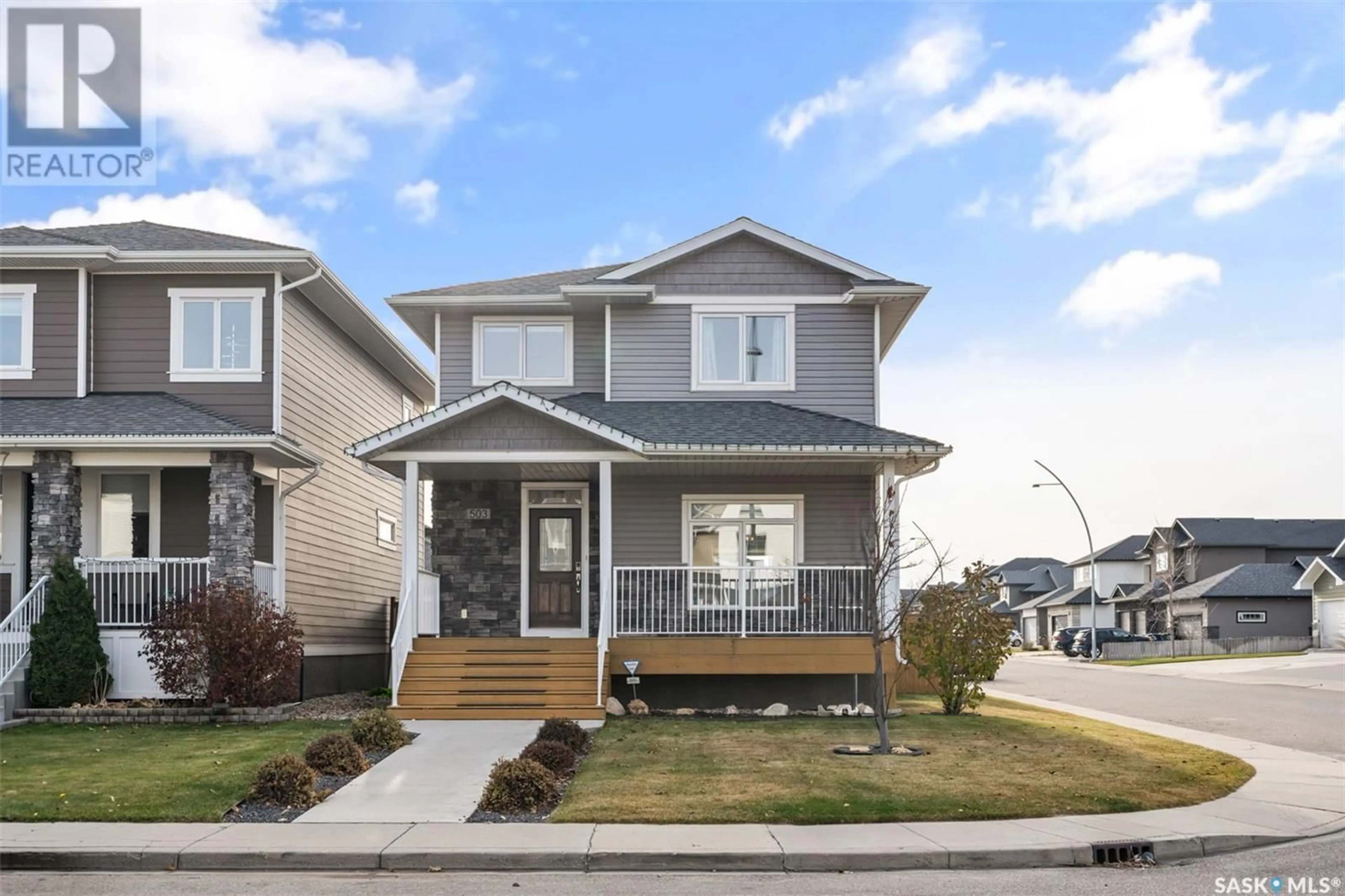 Home with vinyl exterior material, street for 503 Kloppenburg CRESCENT, Saskatoon Saskatchewan S7W0P1