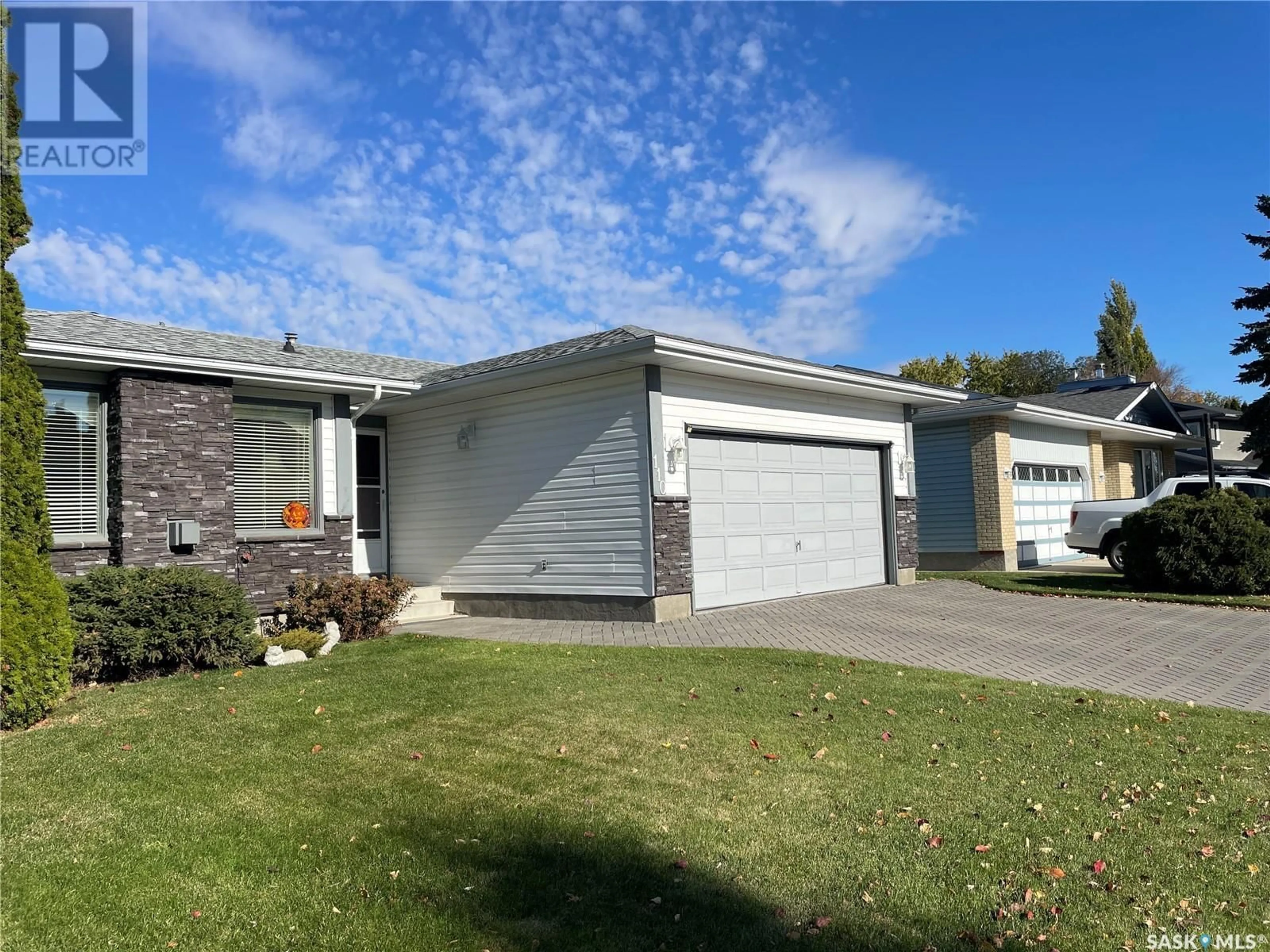 Home with vinyl exterior material, street for 110 Brabant CRESCENT, Saskatoon Saskatchewan S7J4Y9