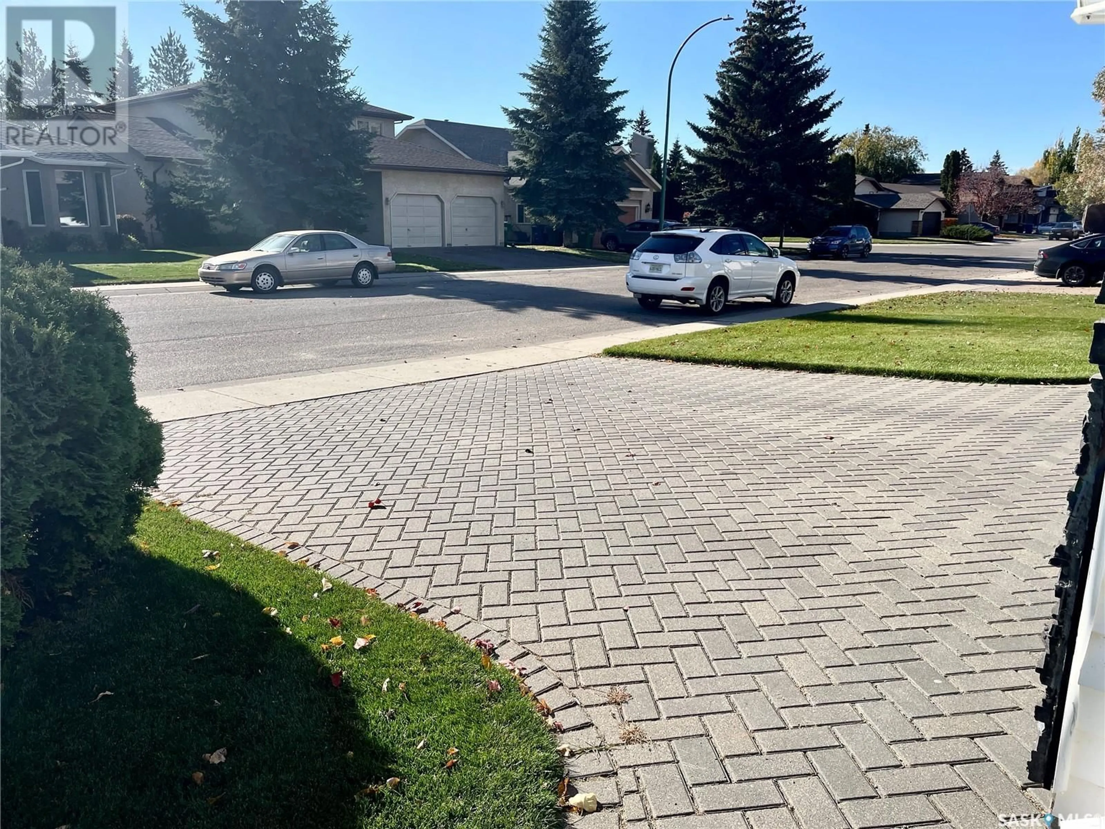 A pic from outside/outdoor area/front of a property/back of a property/a pic from drone, street for 110 Brabant CRESCENT, Saskatoon Saskatchewan S7J4Y9