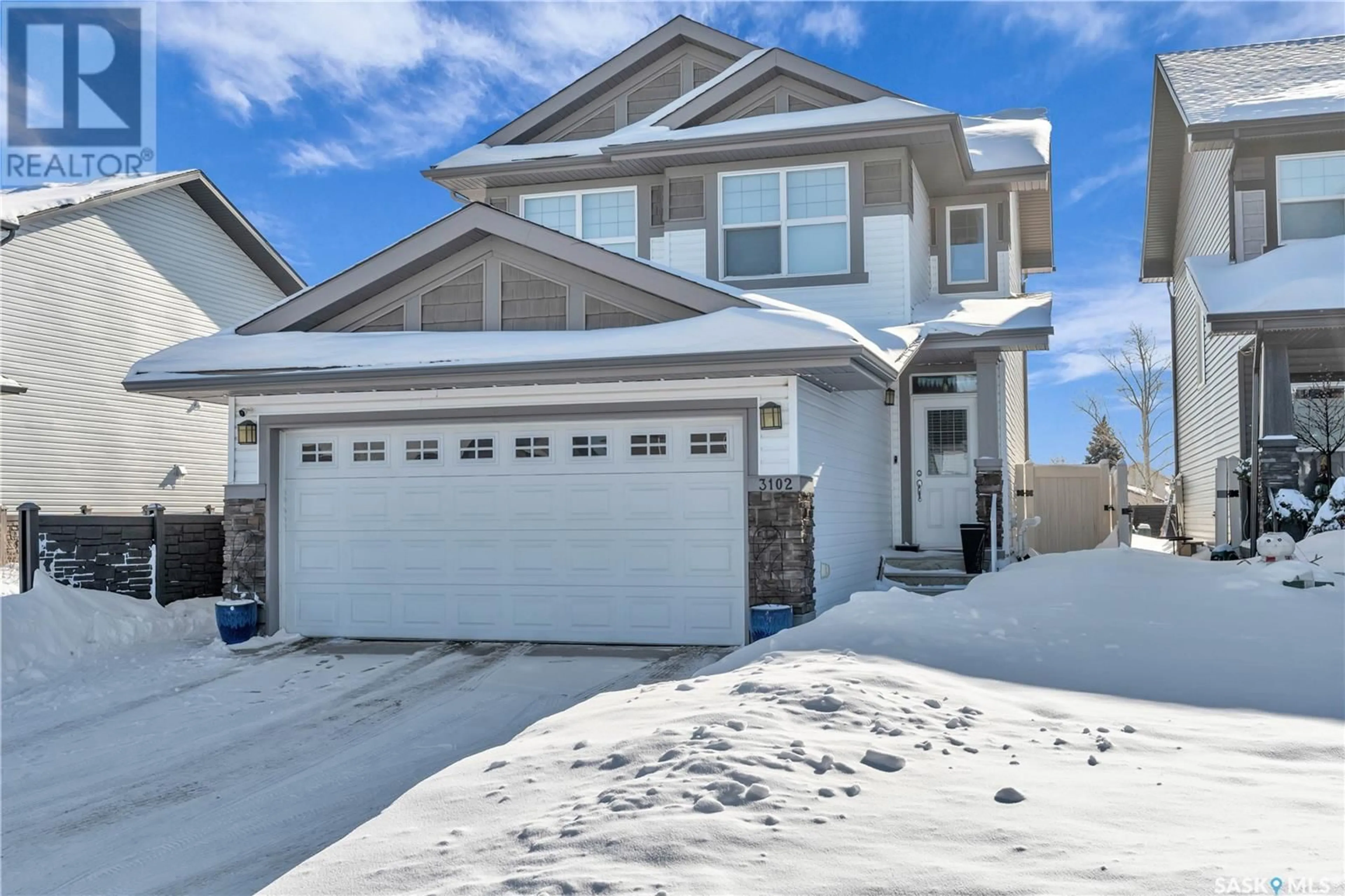 Home with vinyl exterior material, street for 3102 Brock BAY, Regina Saskatchewan S4X0K4