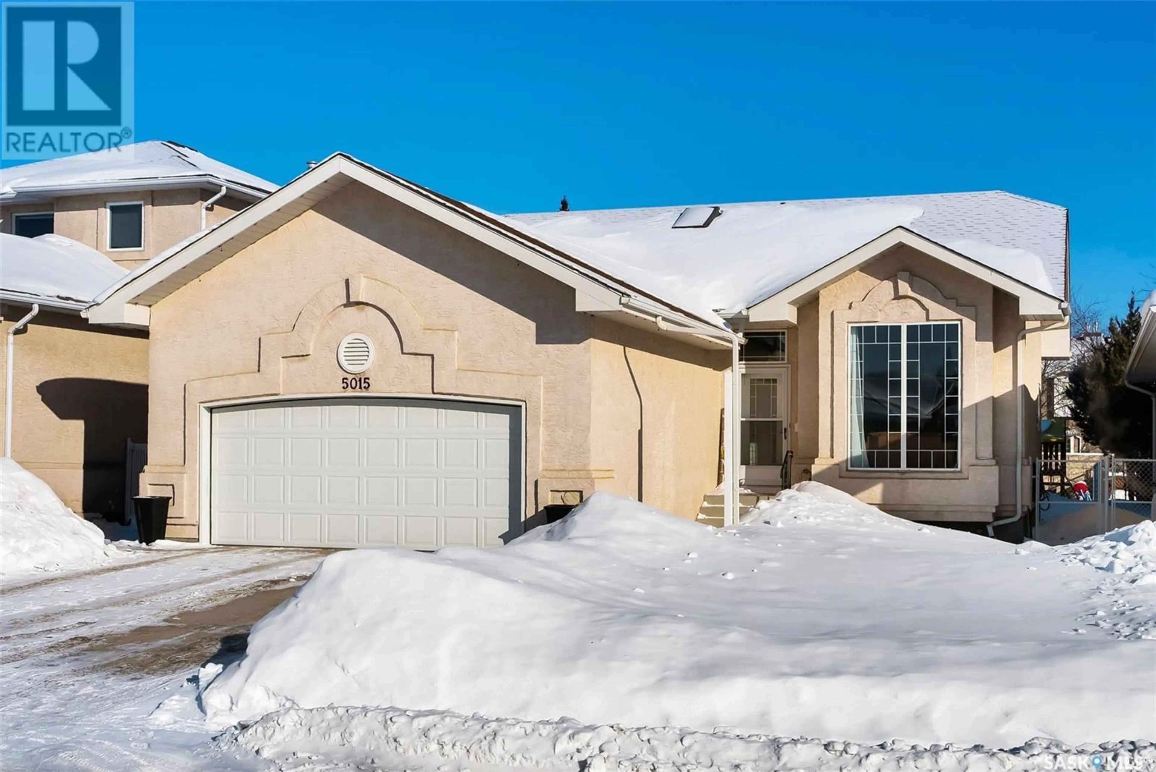 Home with vinyl exterior material, street for 5015 Staff CRESCENT, Regina Saskatchewan S4X4M4