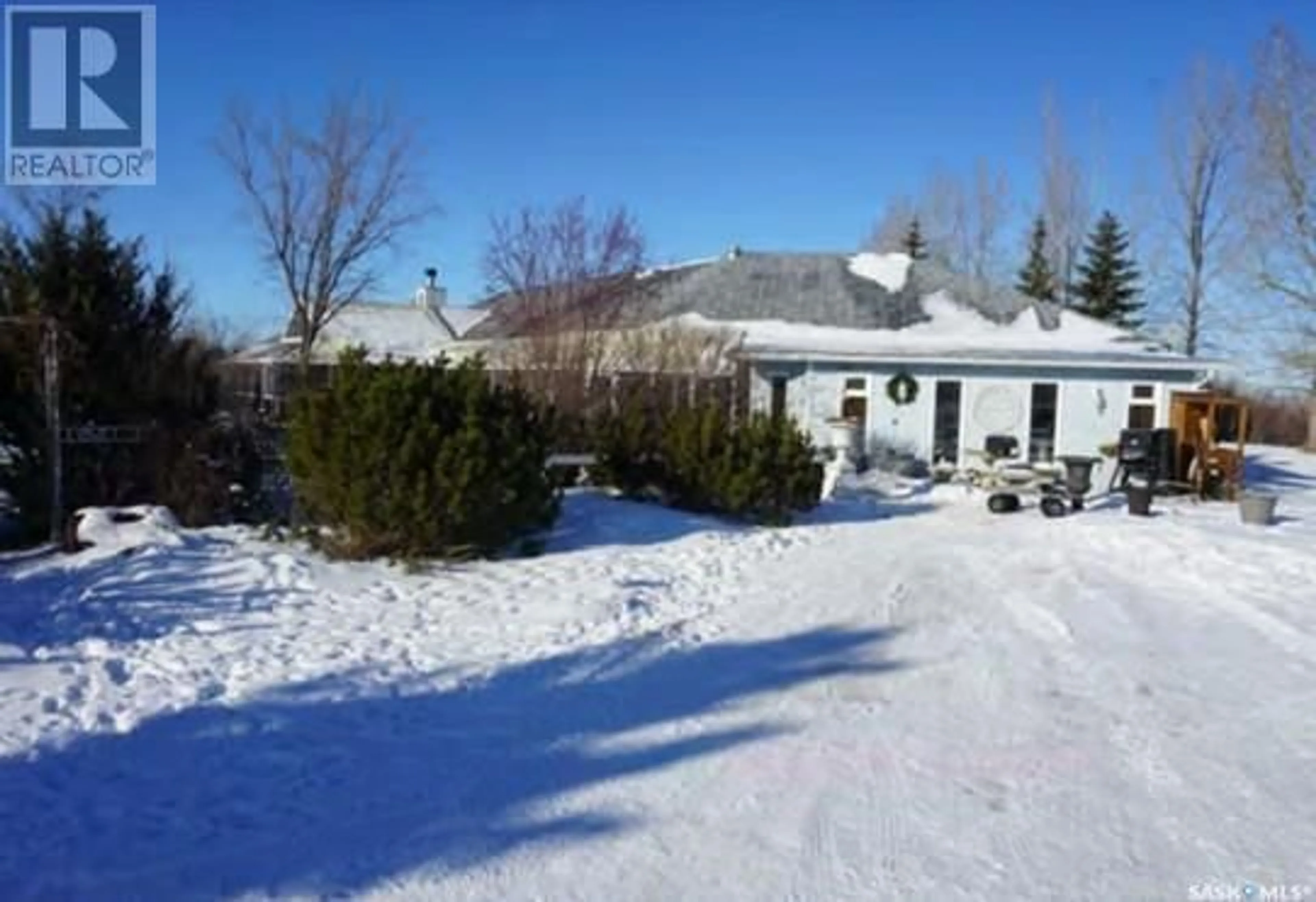 A pic from outside/outdoor area/front of a property/back of a property/a pic from drone, street for MCKENNITT ACREAGE, Carnduff Saskatchewan S0C0S0