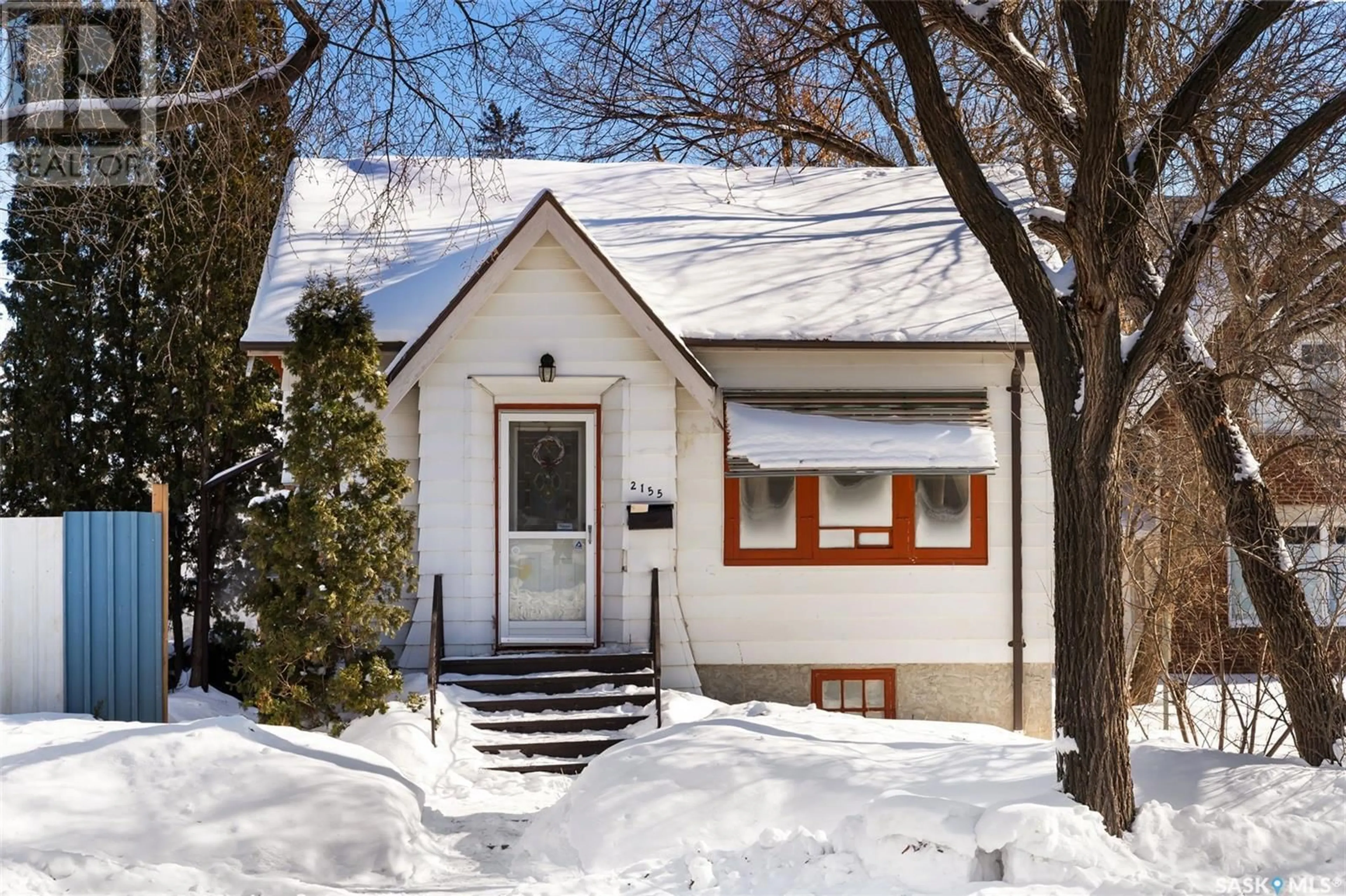 Home with vinyl exterior material, street for 2155 Winnipeg STREET, Regina Saskatchewan S4P1G9