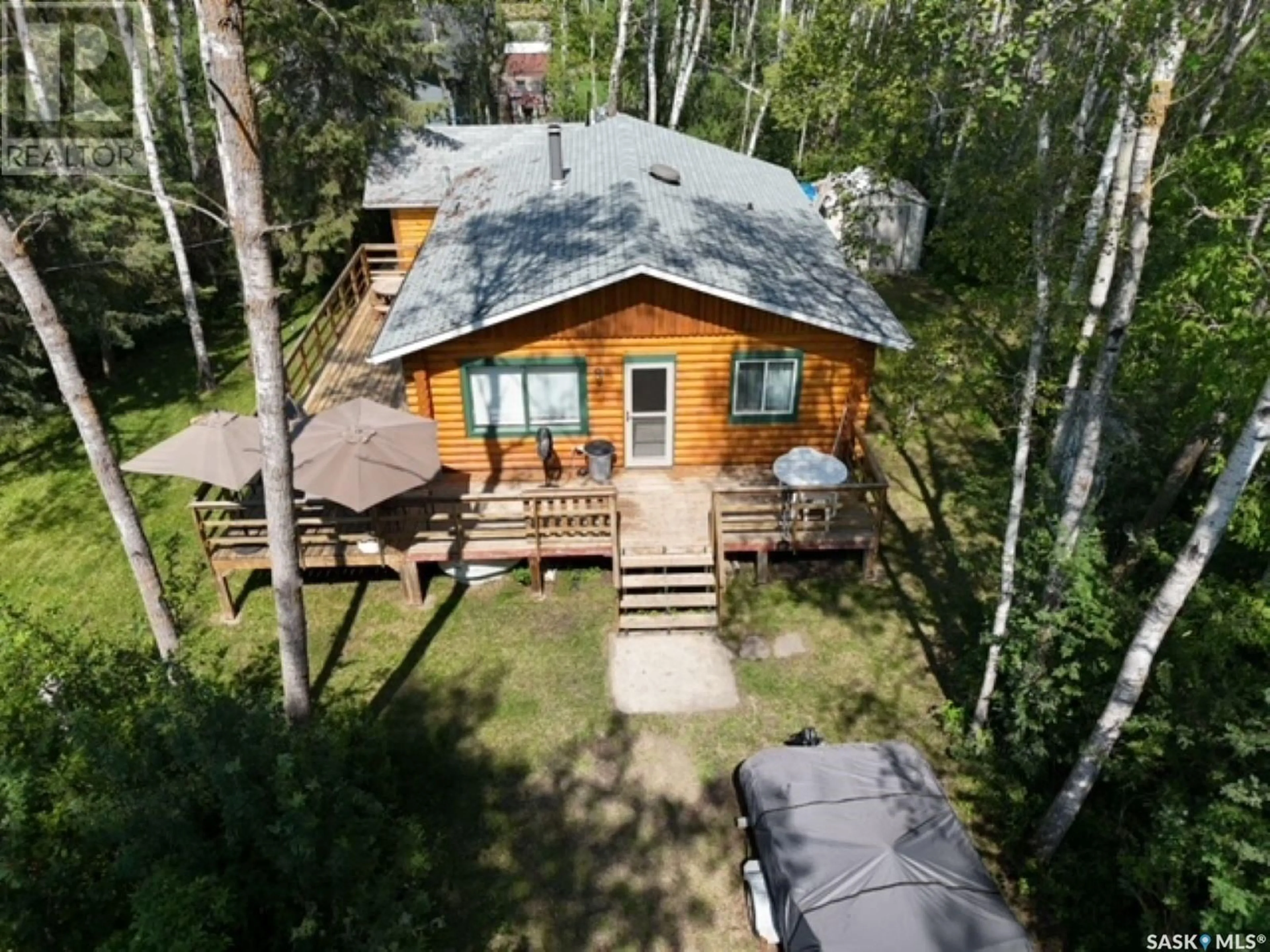 A pic from outside/outdoor area/front of a property/back of a property/a pic from drone, unknown for 300 LOON DRIVE, Big Shell Saskatchewan S0J2G0