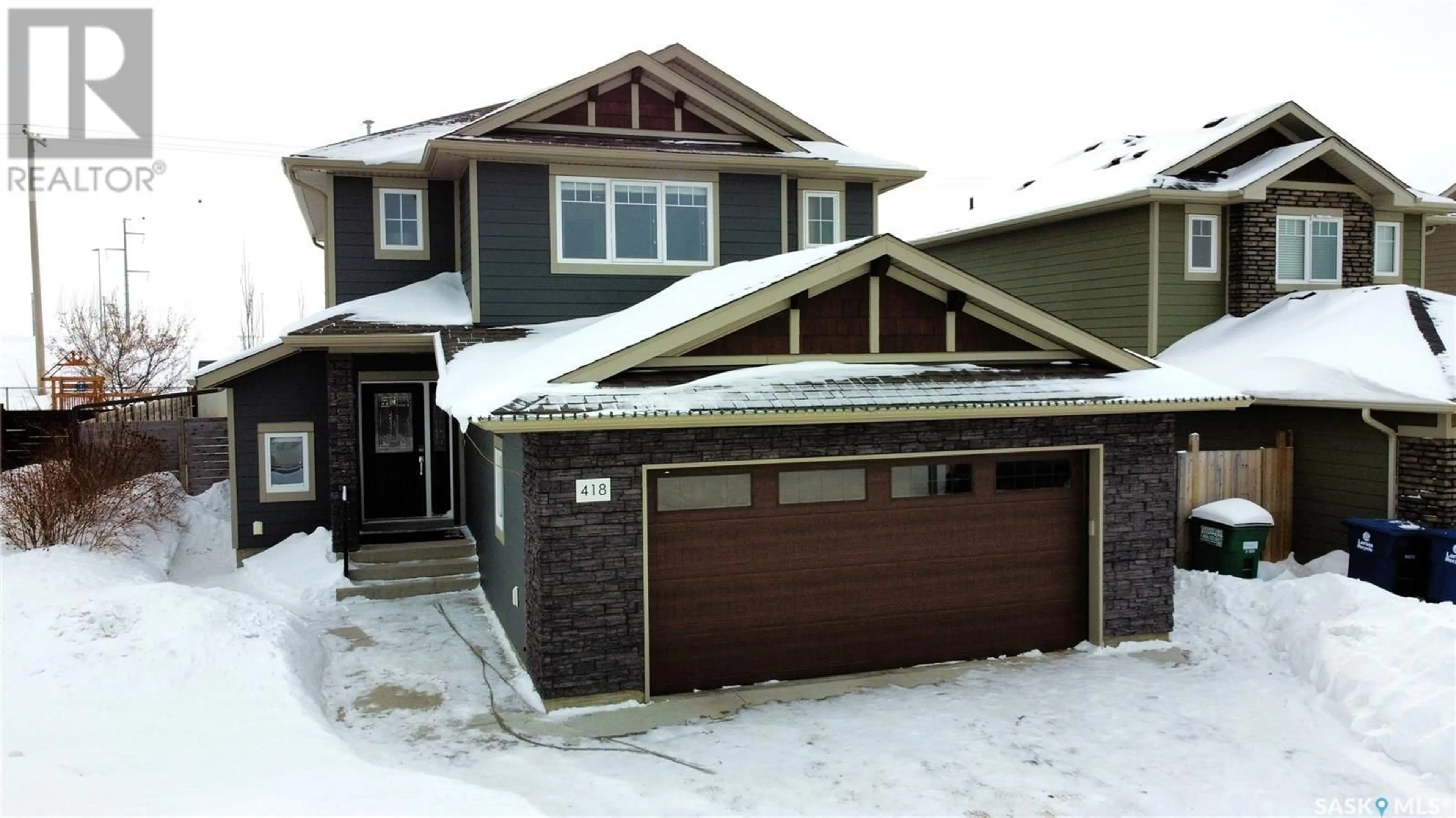 Home with vinyl exterior material, street for 418 Pichler CRESCENT, Saskatoon Saskatchewan S7V0G3