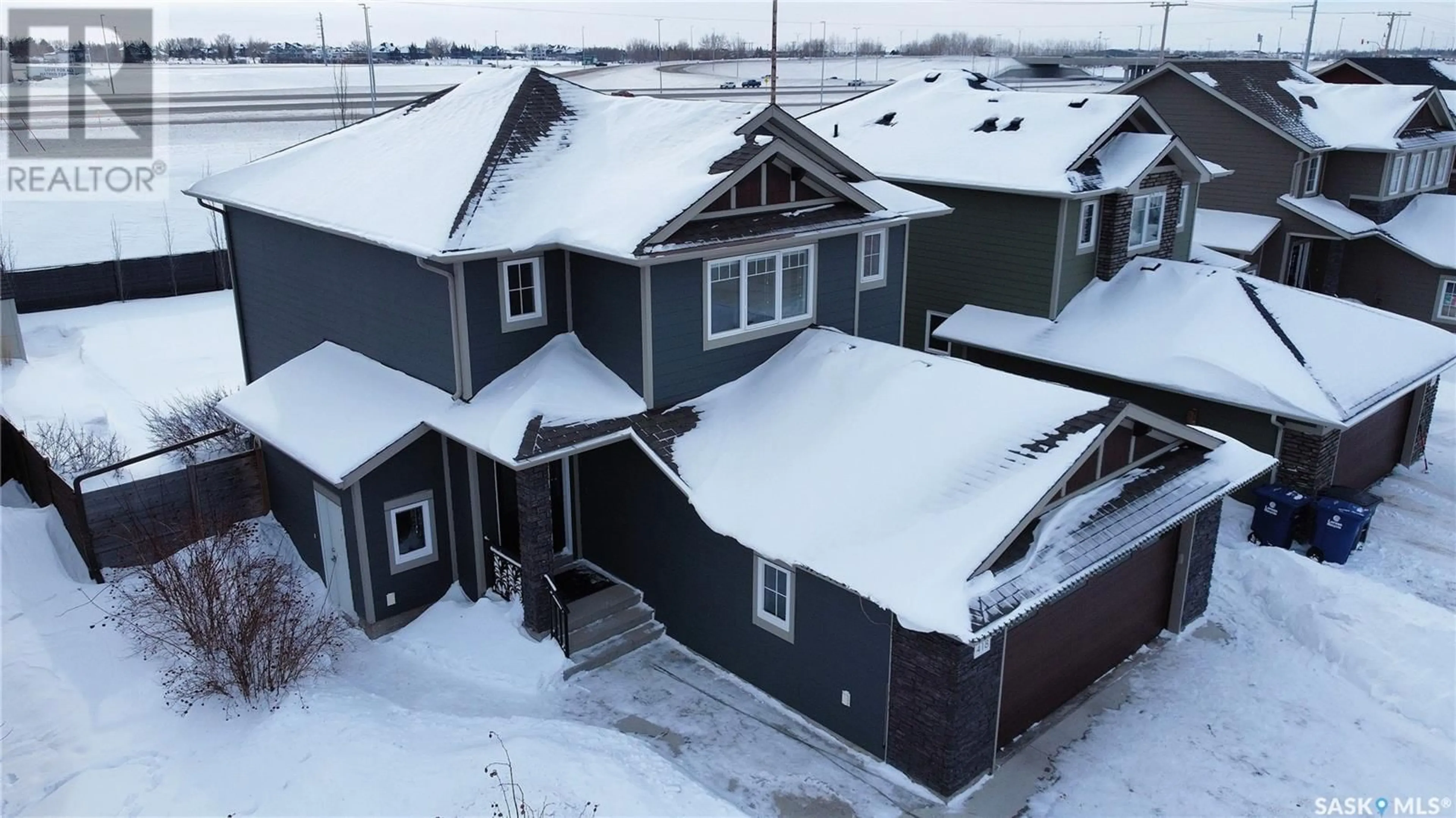 A pic from outside/outdoor area/front of a property/back of a property/a pic from drone, unknown for 418 Pichler CRESCENT, Saskatoon Saskatchewan S7V0G3