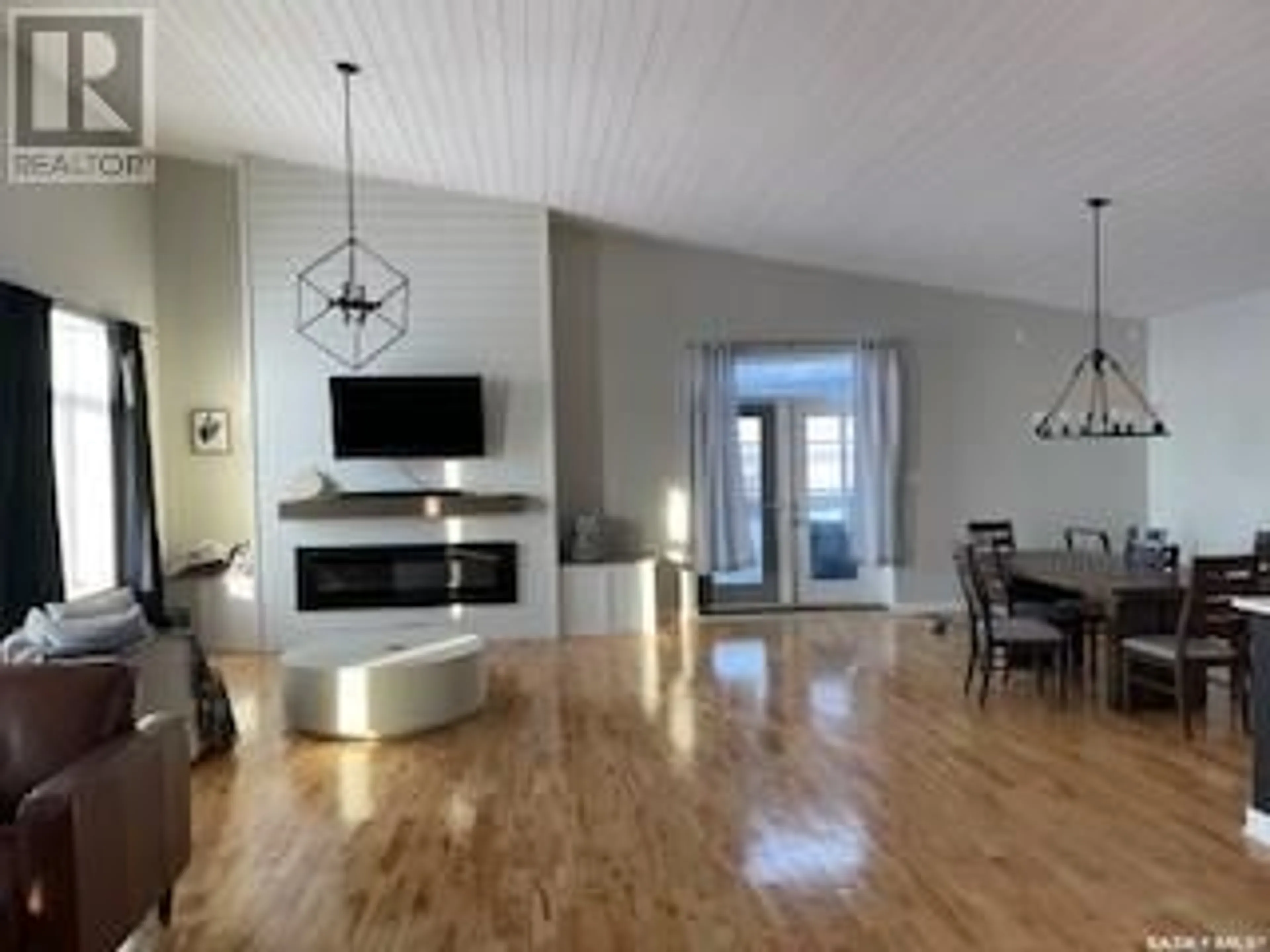 Living room with furniture, unknown for Sutherland Acreage, Vanscoy Rm No. 345 Saskatchewan S0K1V0