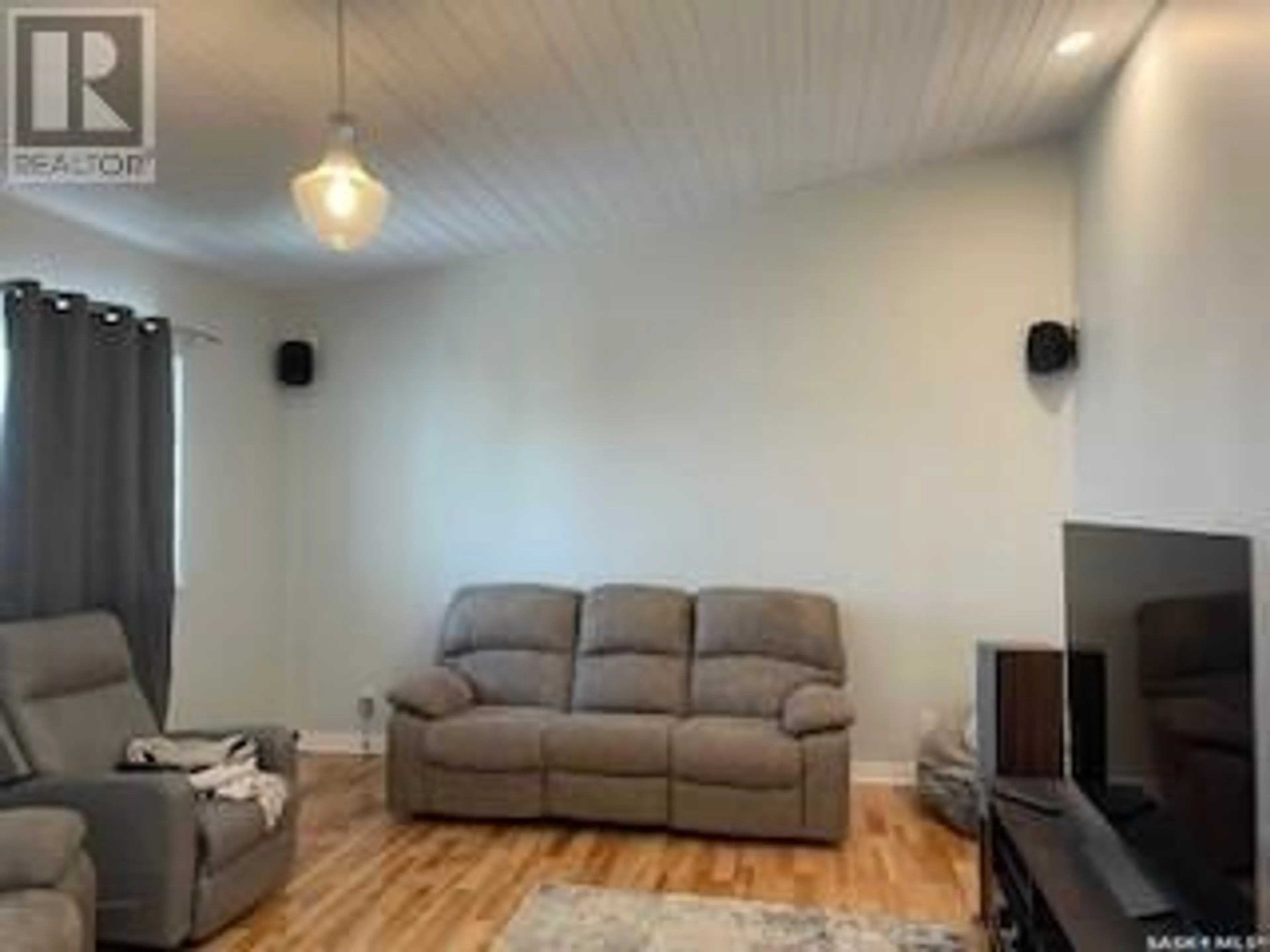 Living room with furniture, unknown for Sutherland Acreage, Vanscoy Rm No. 345 Saskatchewan S0K1V0