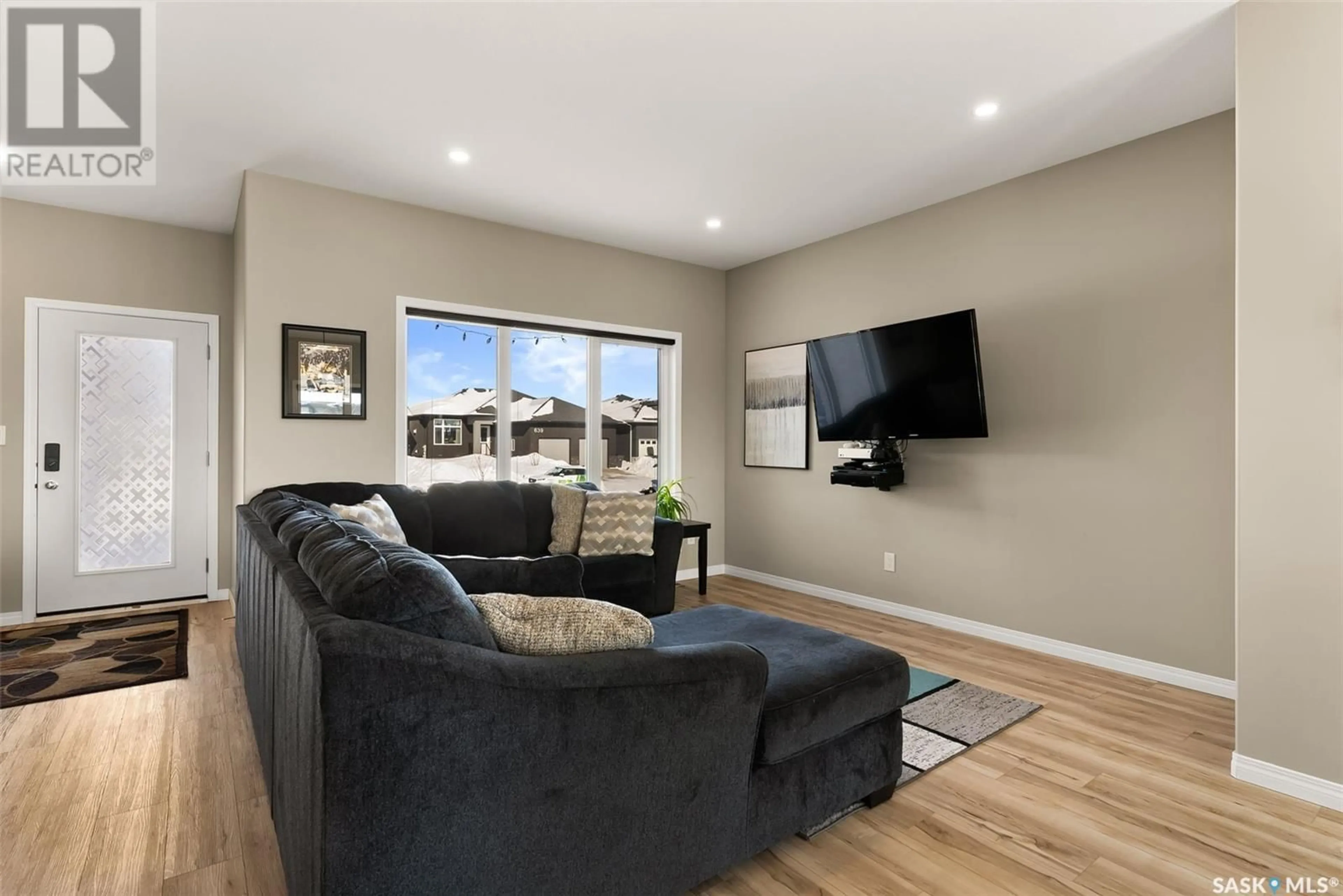 Living room with furniture, unknown for 642 Aspen CRESCENT, Pilot Butte Saskatchewan S0G3Z0