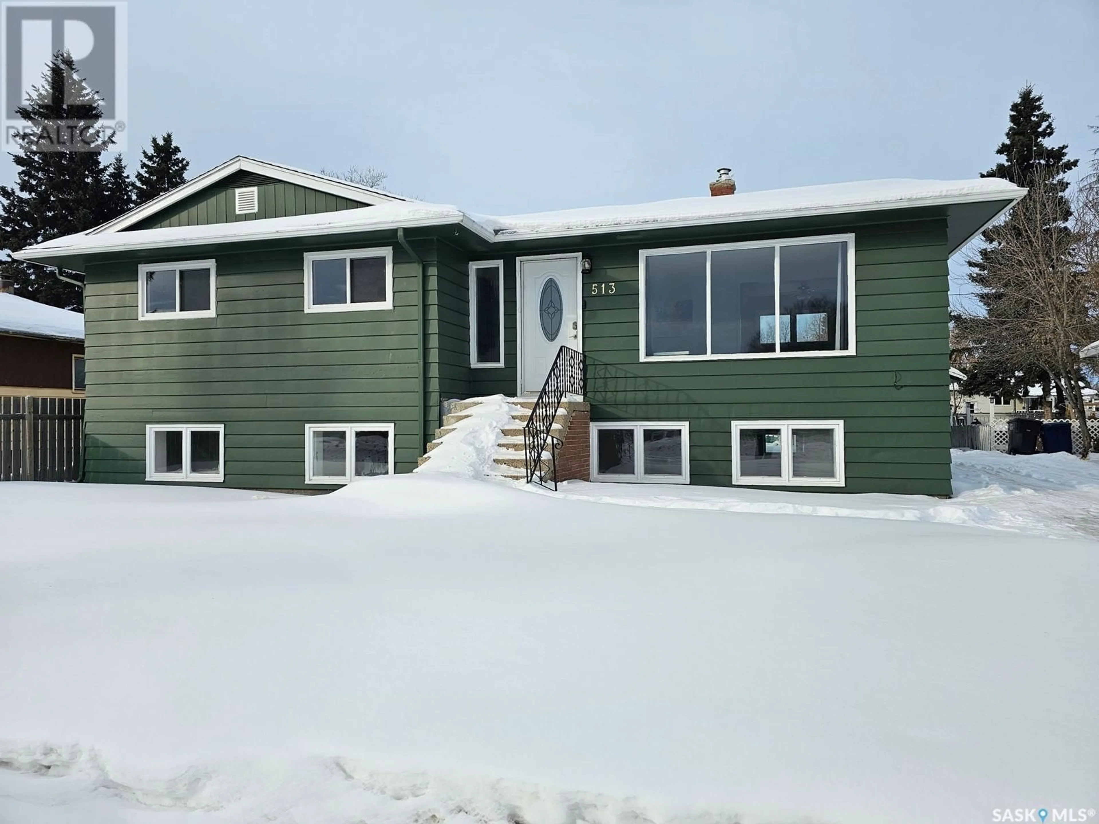 Home with vinyl exterior material, street for 513 Centre STREET, Meadow Lake Saskatchewan S9X1E1