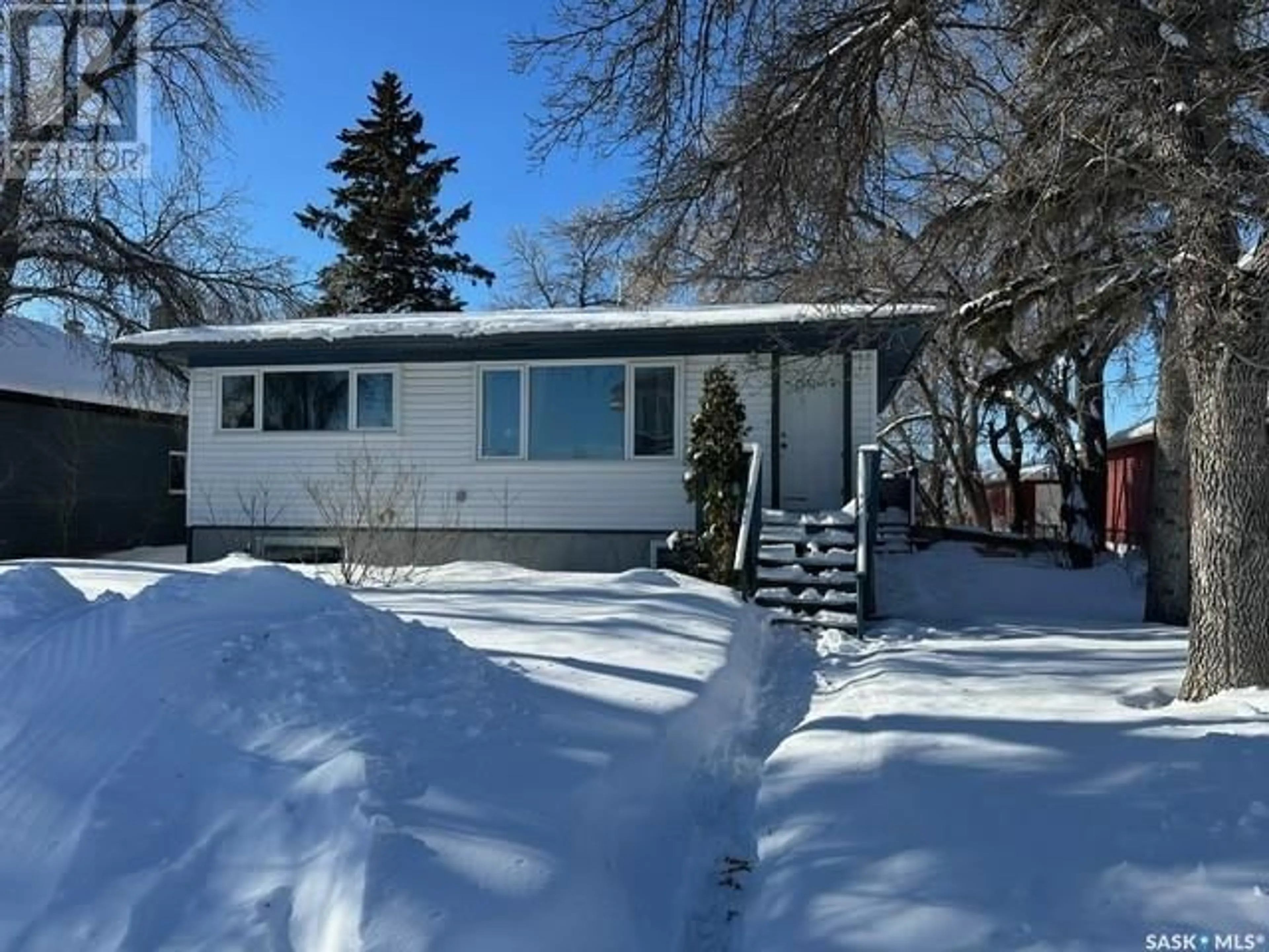 Home with vinyl exterior material, street for 1052 Edgar STREET, Regina Saskatchewan S4N3J4