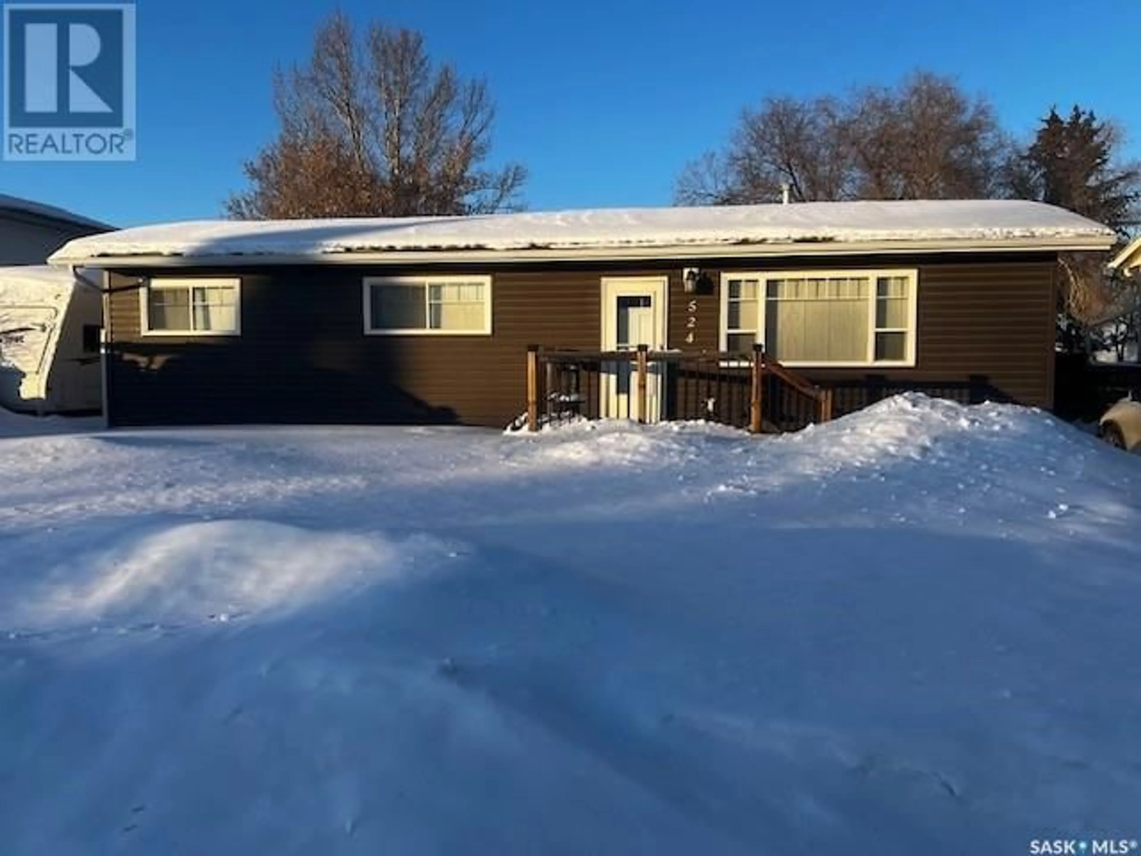 A pic from outside/outdoor area/front of a property/back of a property/a pic from drone, street for 524 Ross AVENUE, Dalmeny Saskatchewan S0K1E0