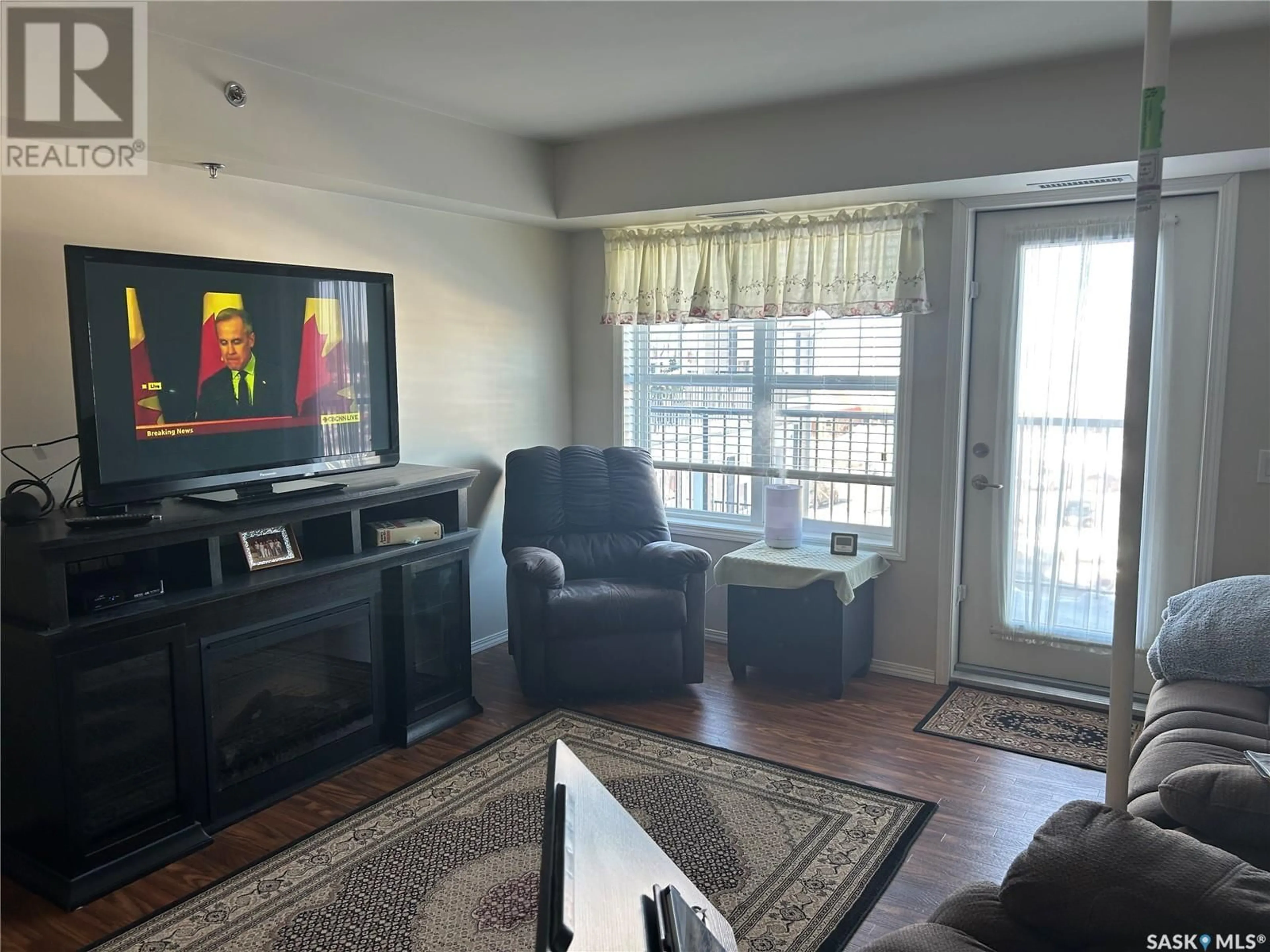 Living room with furniture, unknown for 402 601 110th AVENUE, Tisdale Saskatchewan S0E1T0