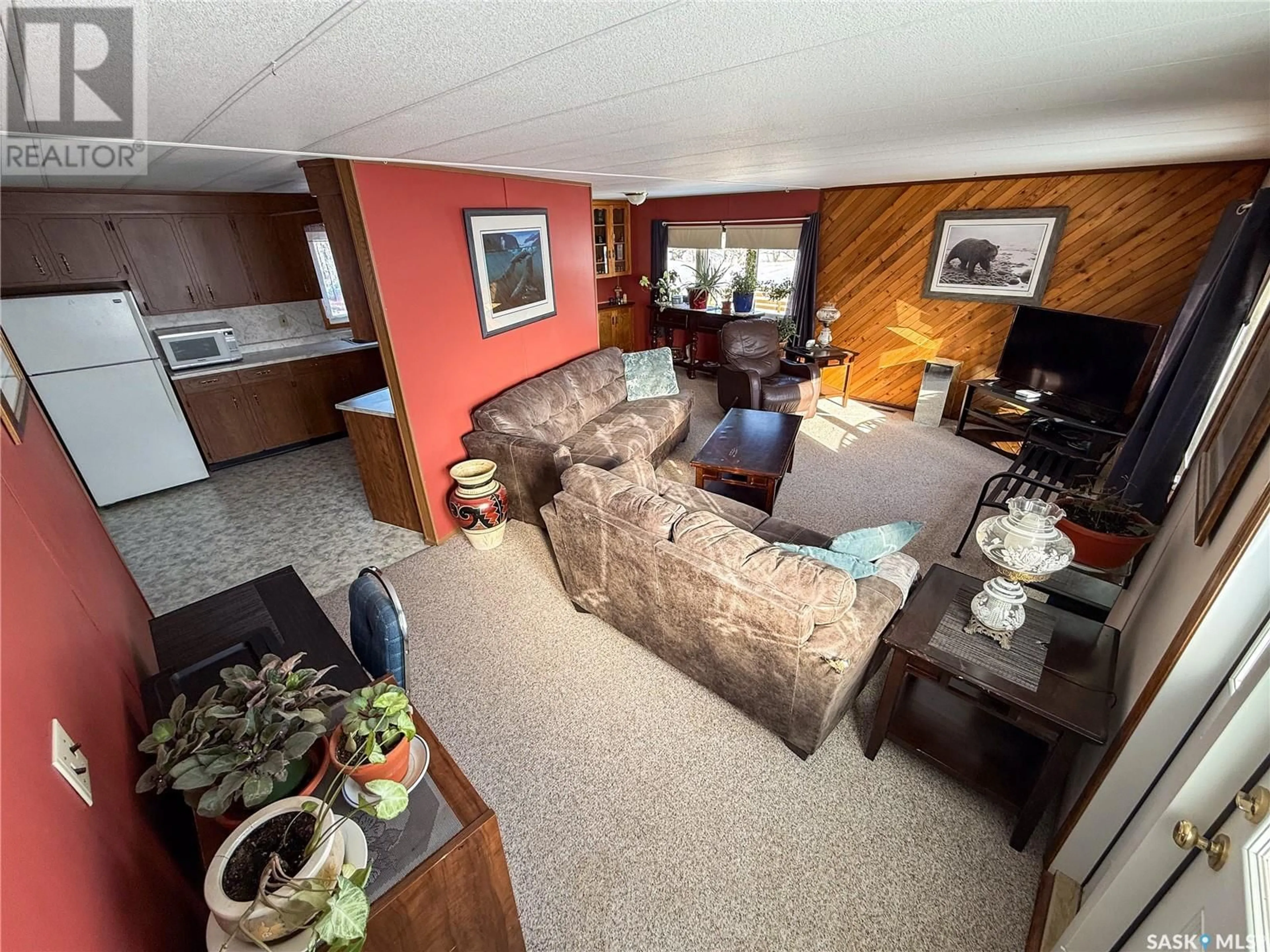 Living room with furniture, unknown for 201 - 203 4TH AVENUE, Climax Saskatchewan S0N0N0
