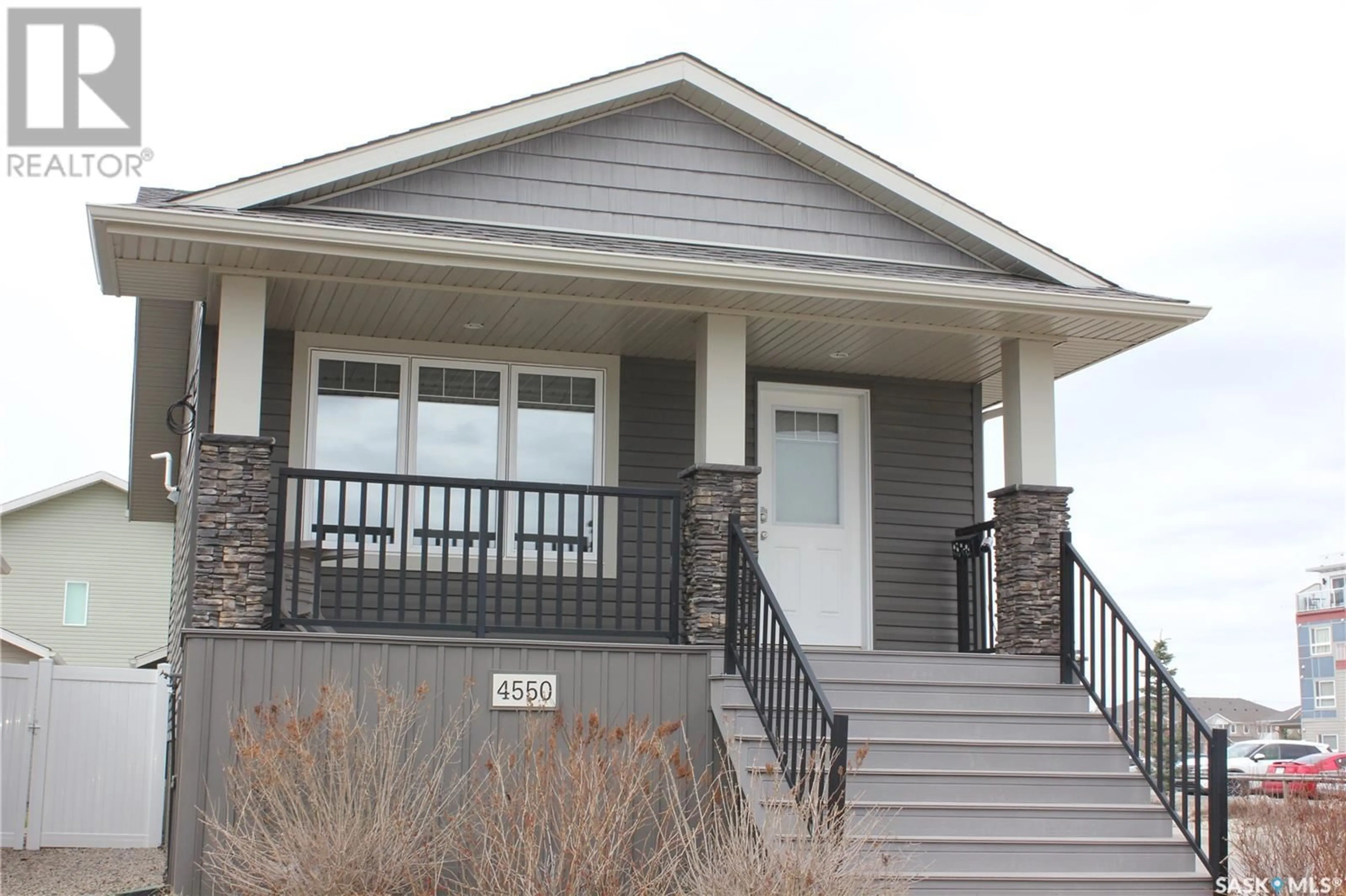 Home with vinyl exterior material, street for 4550 JAMES HILL ROAD, Regina Saskatchewan S4W0K8