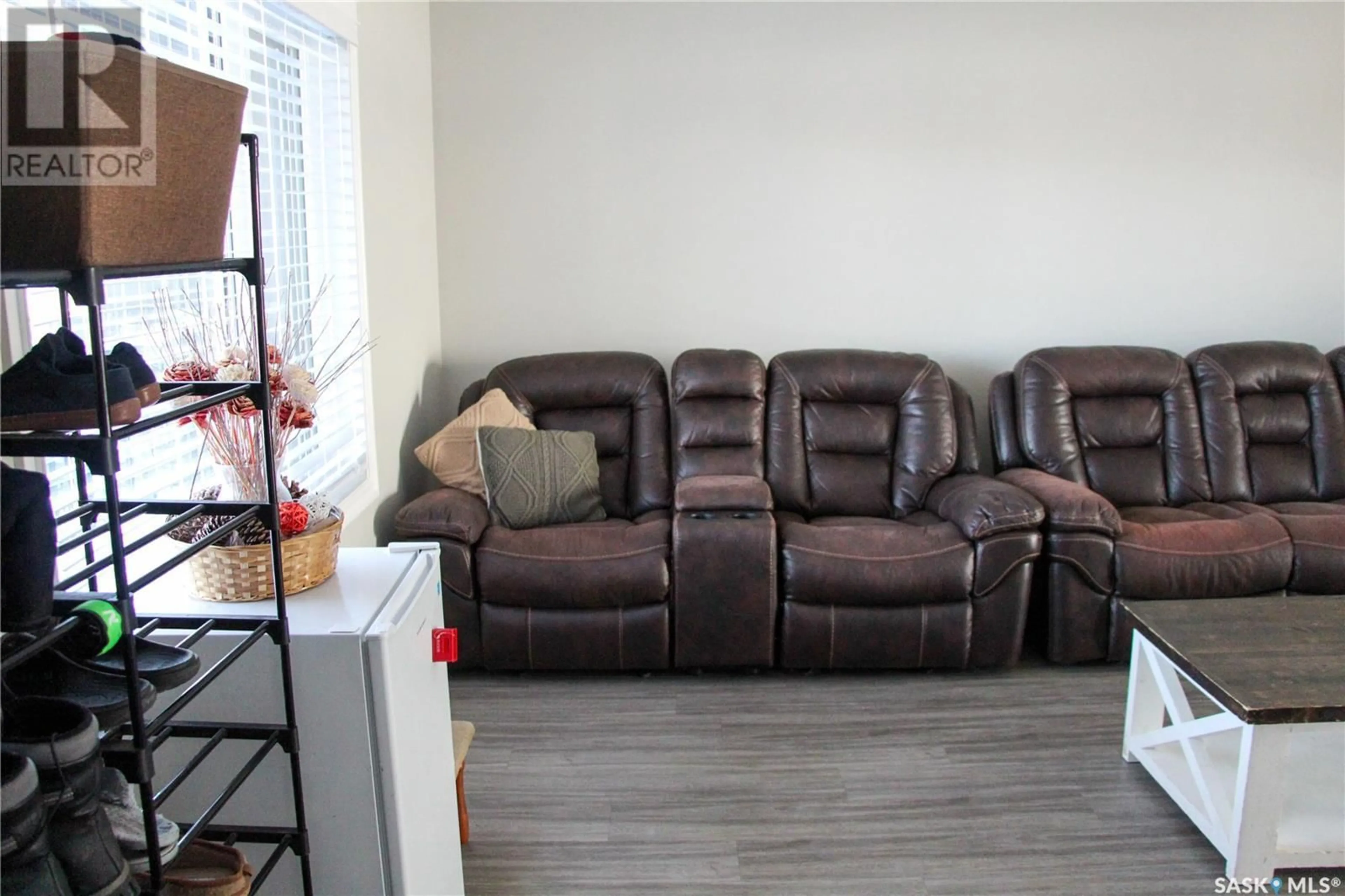 Living room with furniture, unknown for 310 110 Akhtar BEND, Saskatoon Saskatchewan S7W0B8