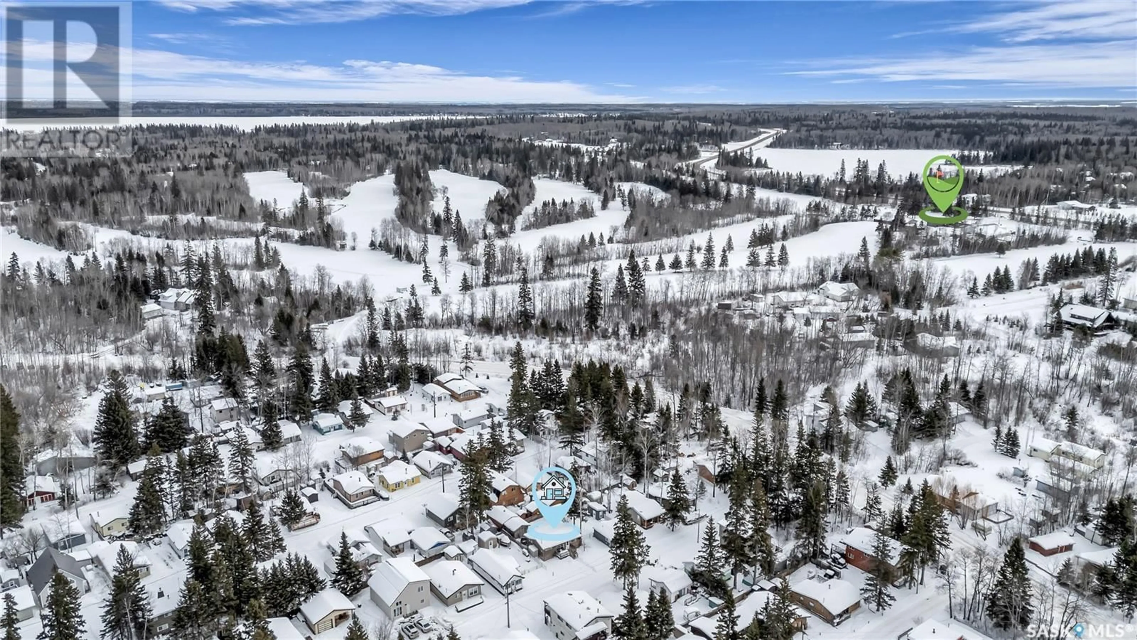 A pic from outside/outdoor area/front of a property/back of a property/a pic from drone, mountain view for 30 6th STREET, Emma Lake Saskatchewan S0J0N0