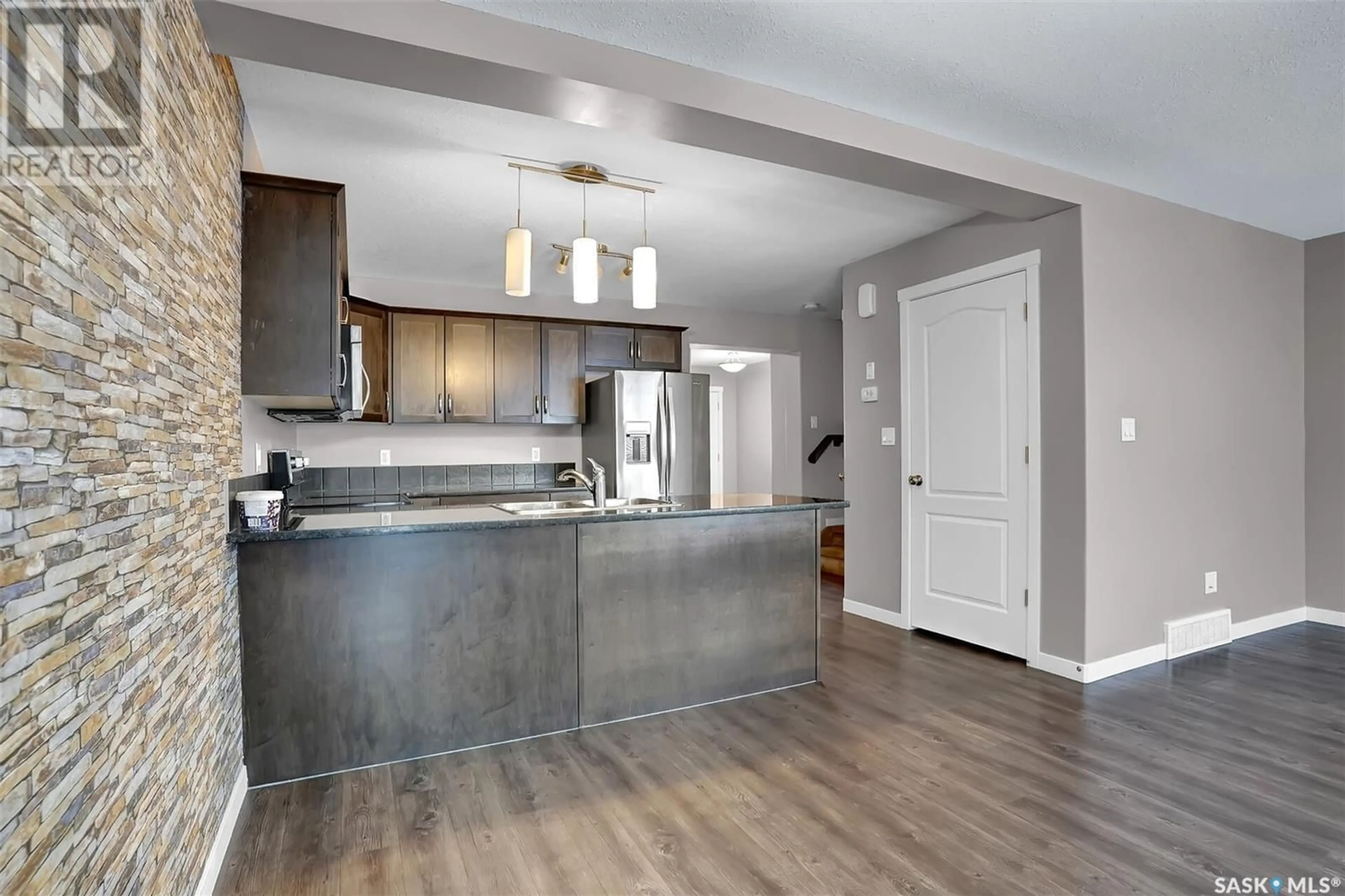 Open concept kitchen, unknown for 803 2 Savanna CRESCENT, Pilot Butte Saskatchewan S0G3Z0