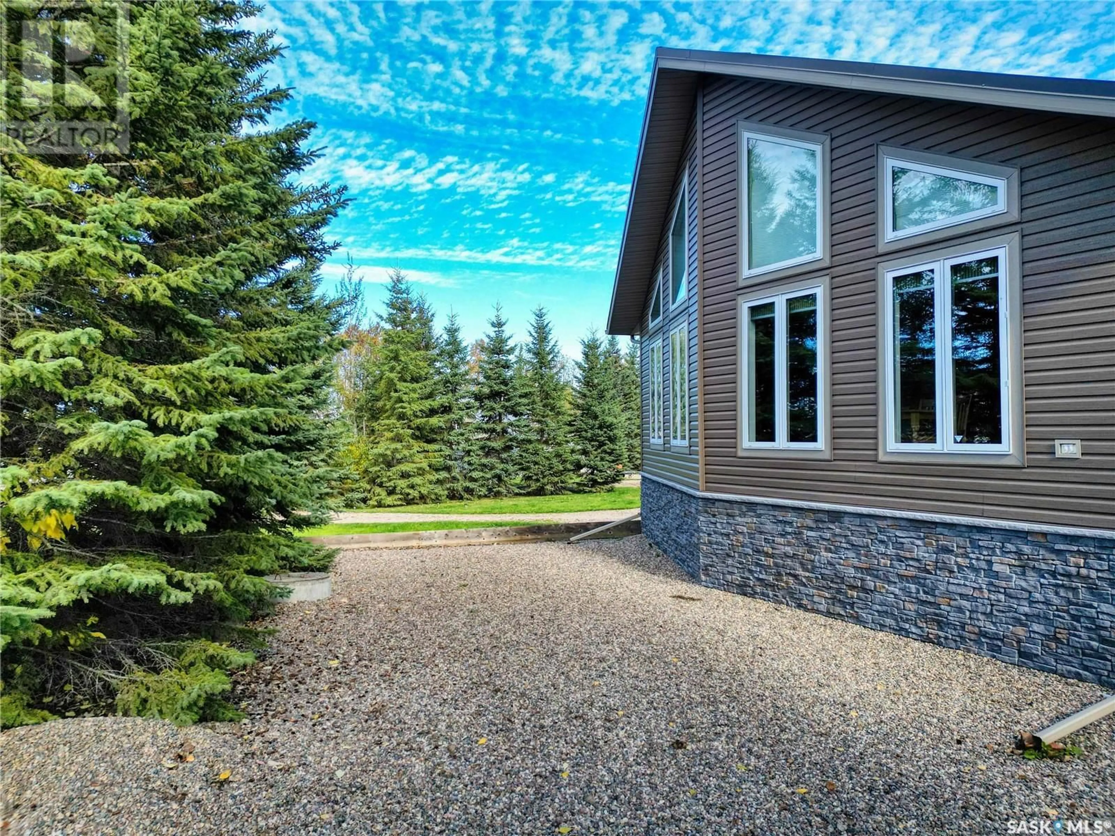Home with brick exterior material, street for 114 DEERLAND ROAD, Lac Des Iles Saskatchewan S0M1A0