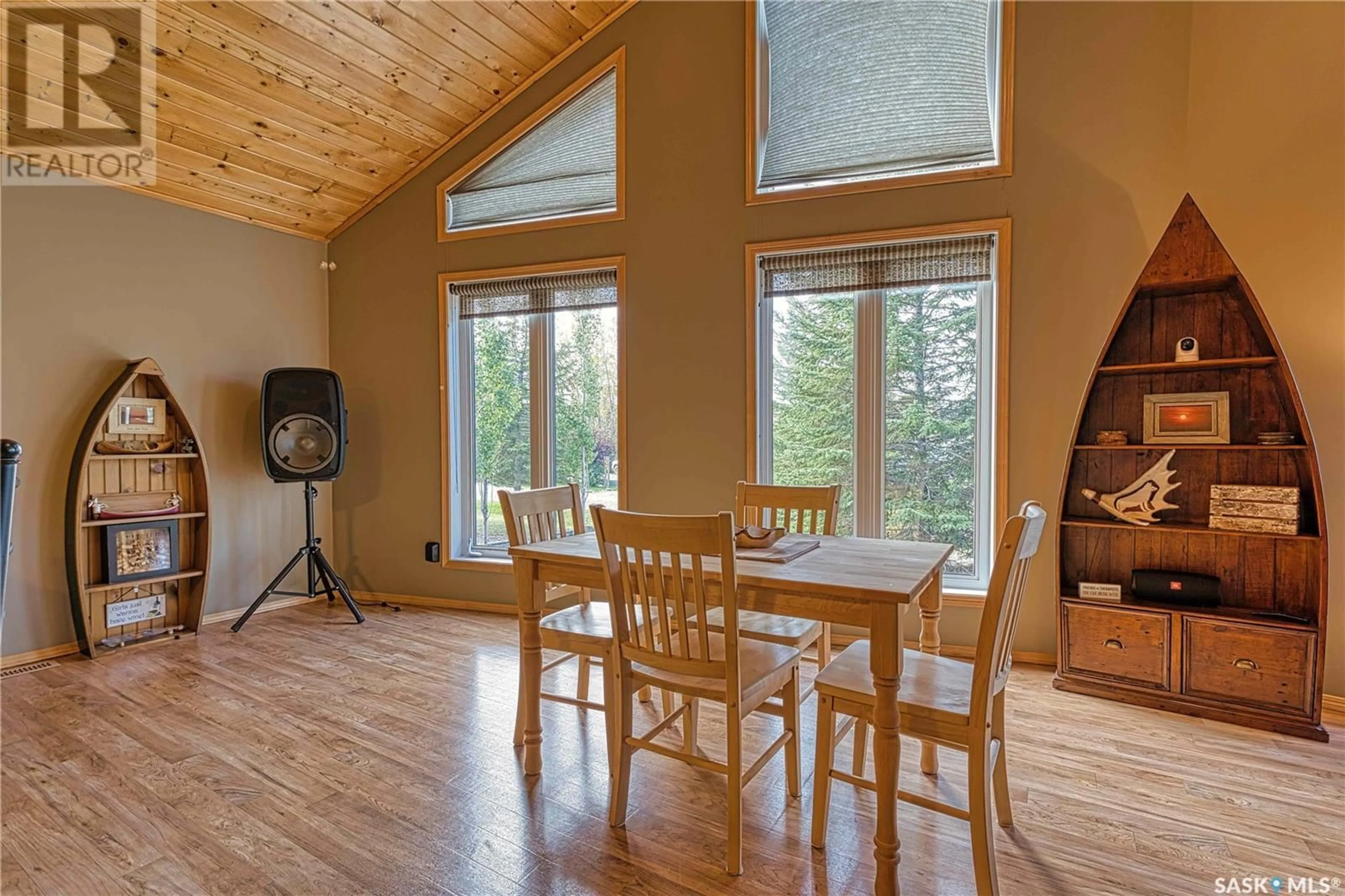 Dining room, wood/laminate floor for 114 Deerland ROAD, Lac Des Iles Saskatchewan S0M1A0