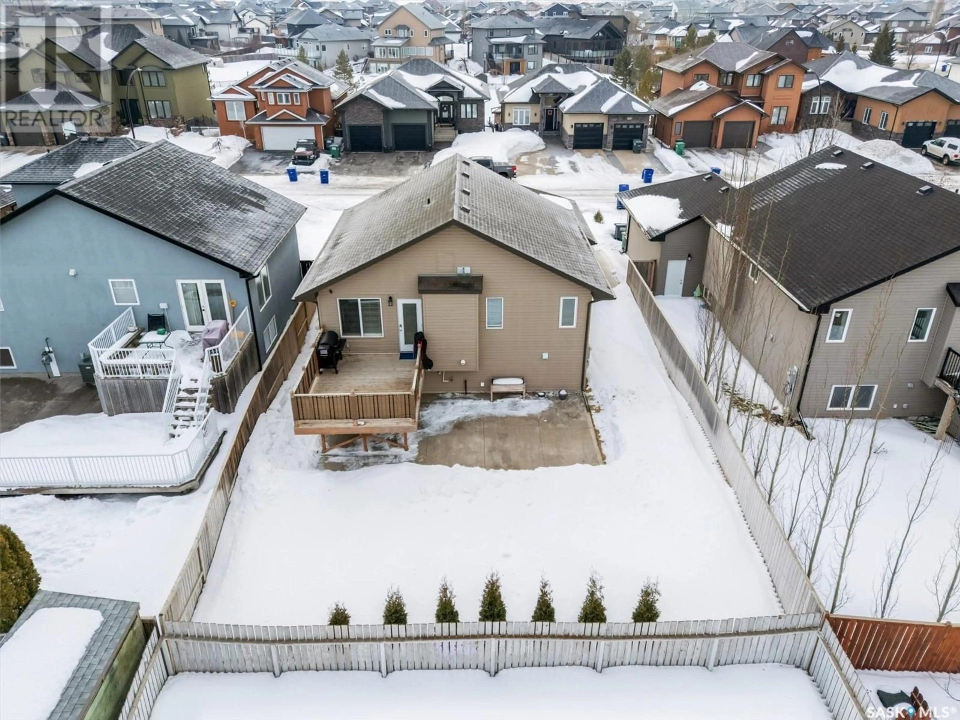 A pic from outside/outdoor area/front of a property/back of a property/a pic from drone, street for 122 Bennion CRESCENT, Saskatoon Saskatchewan S7W0H1