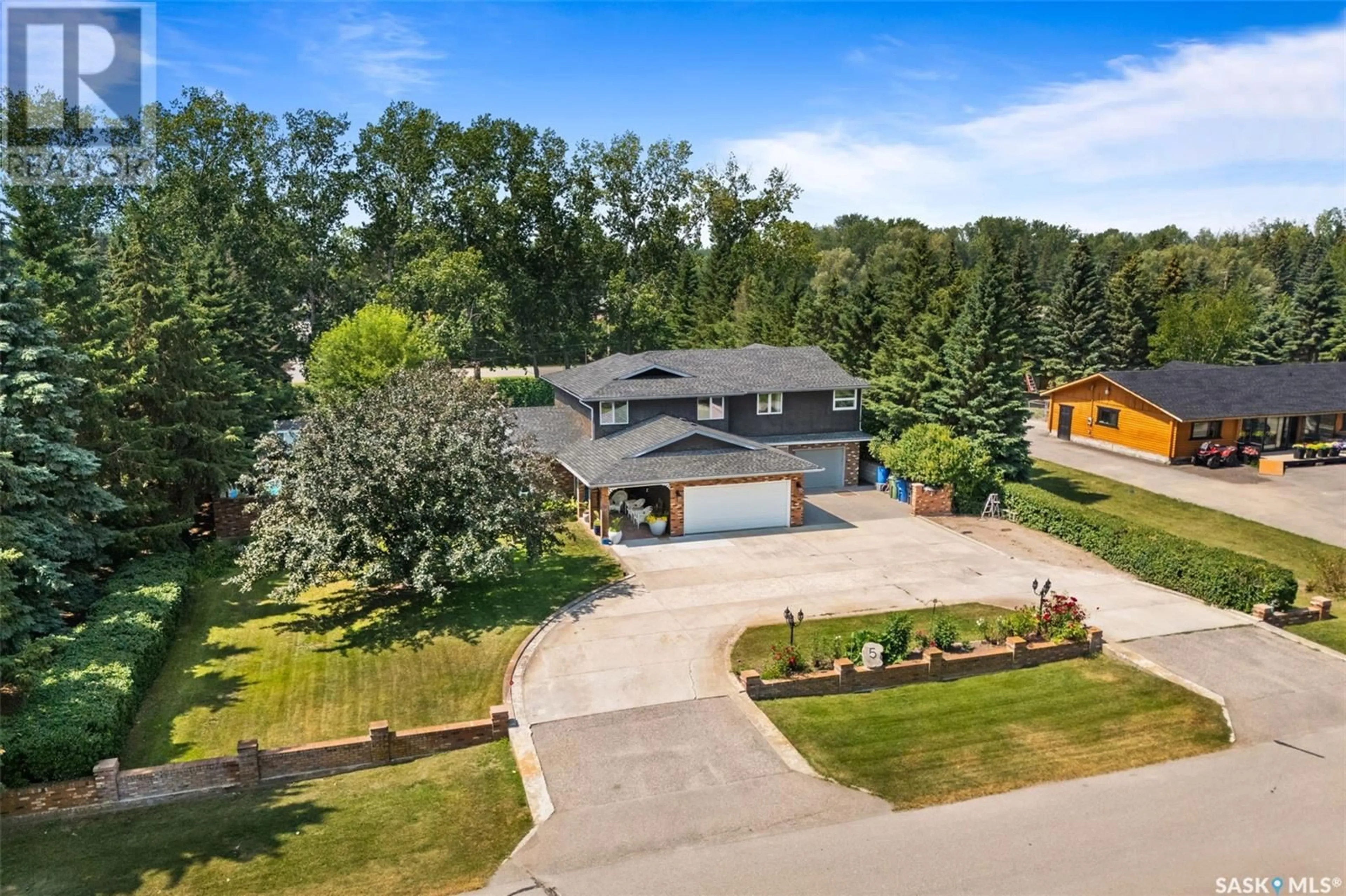 A pic from outside/outdoor area/front of a property/back of a property/a pic from drone, unknown for 5 CAPITOL PLACE, White City Saskatchewan S4L0C7
