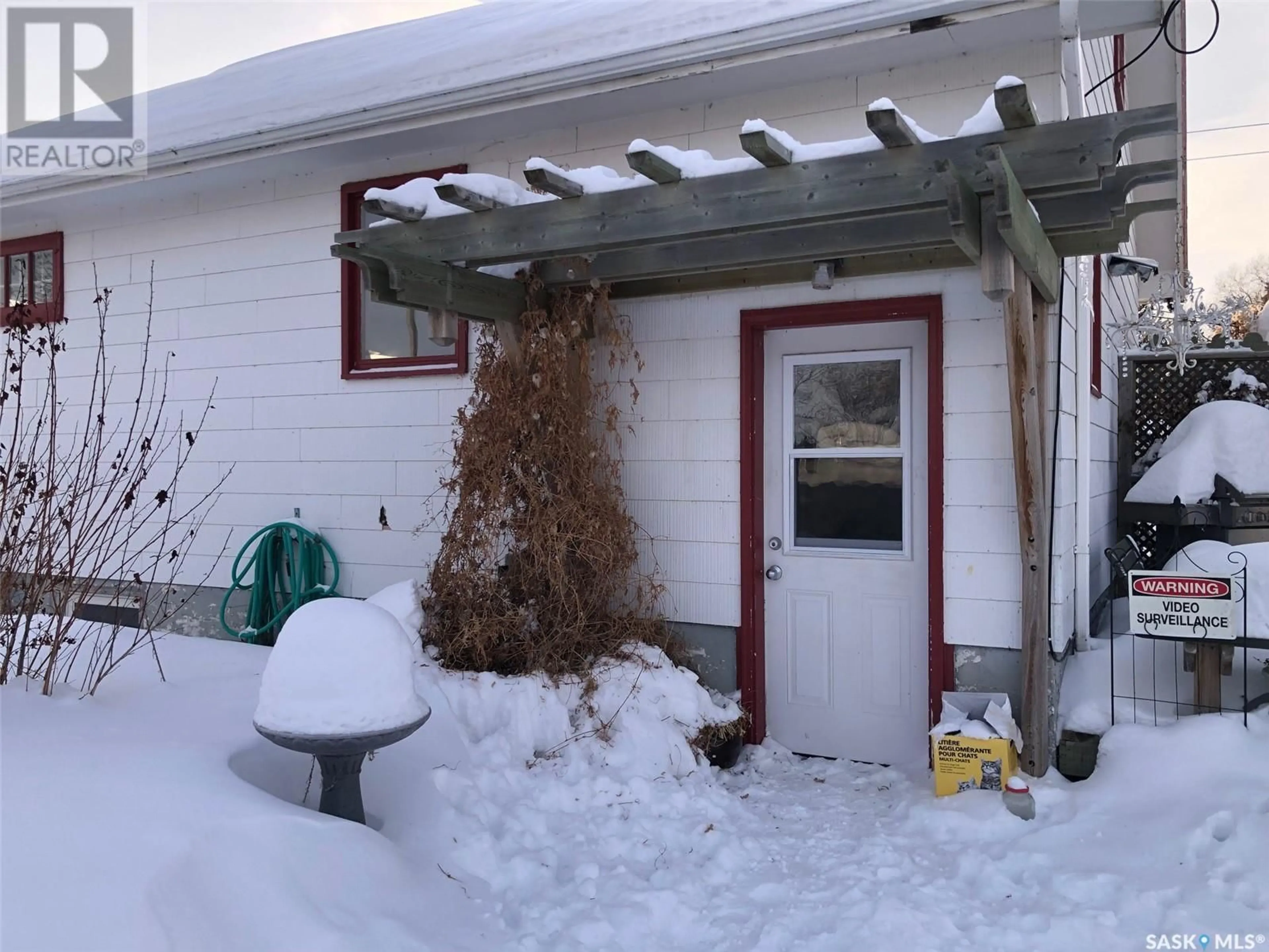 A pic from outside/outdoor area/front of a property/back of a property/a pic from drone, street for 121 BUSH AVENUE, Canora Saskatchewan S0A0L0