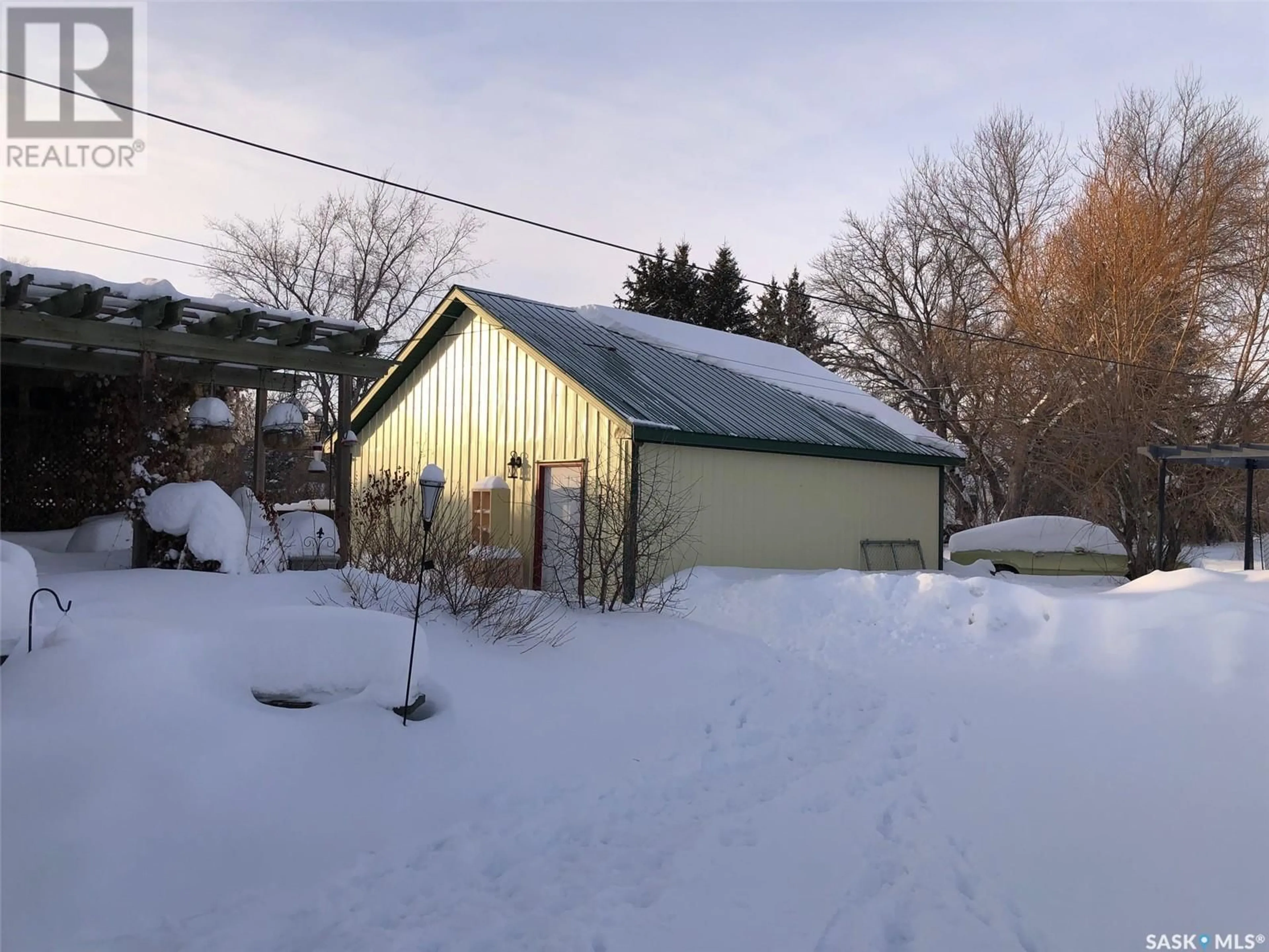 A pic from outside/outdoor area/front of a property/back of a property/a pic from drone, street for 121 BUSH AVENUE, Canora Saskatchewan S0A0L0