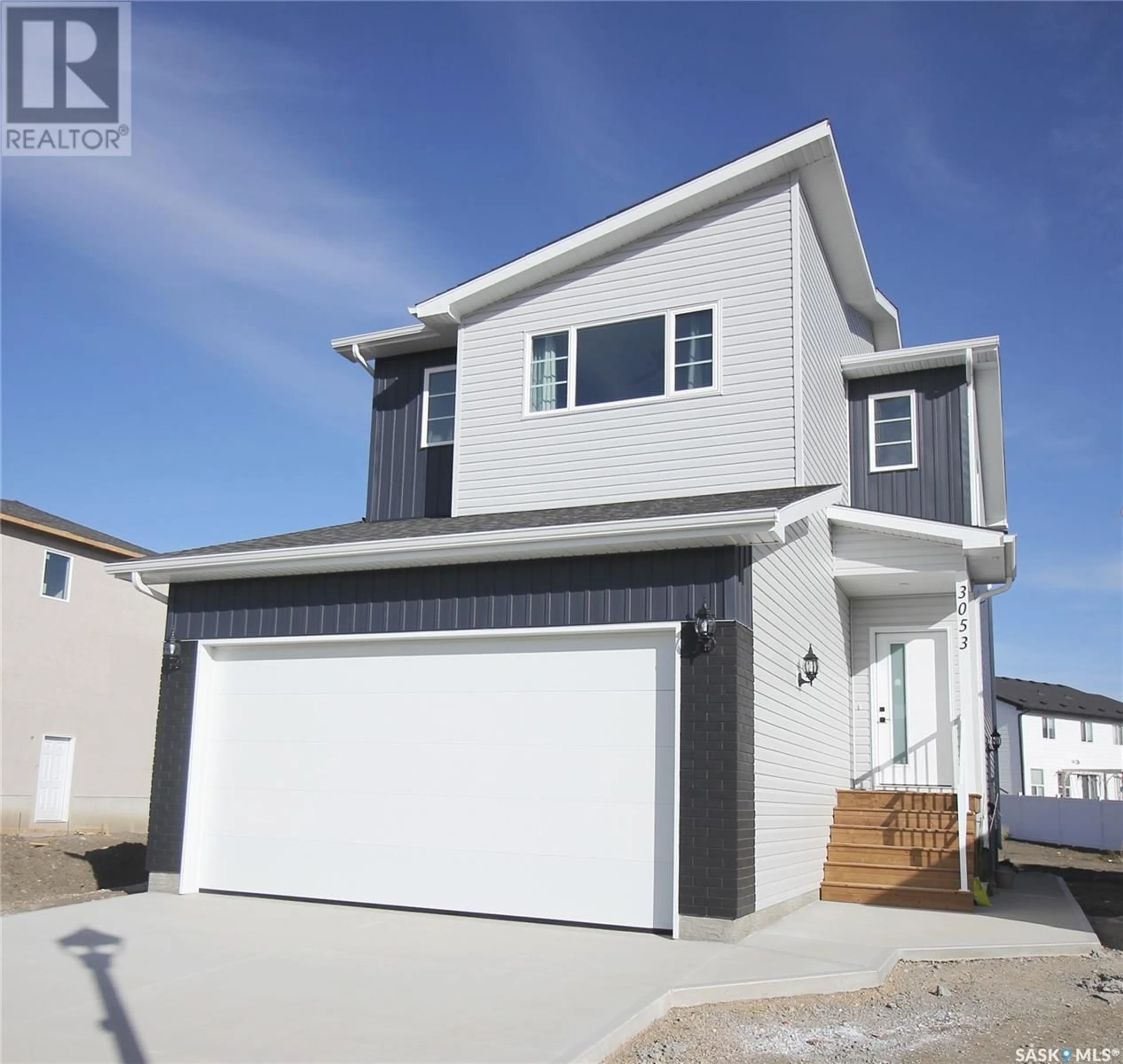 Home with vinyl exterior material, street for 3095 Dumont WAY, Regina Saskatchewan S4V3Z3