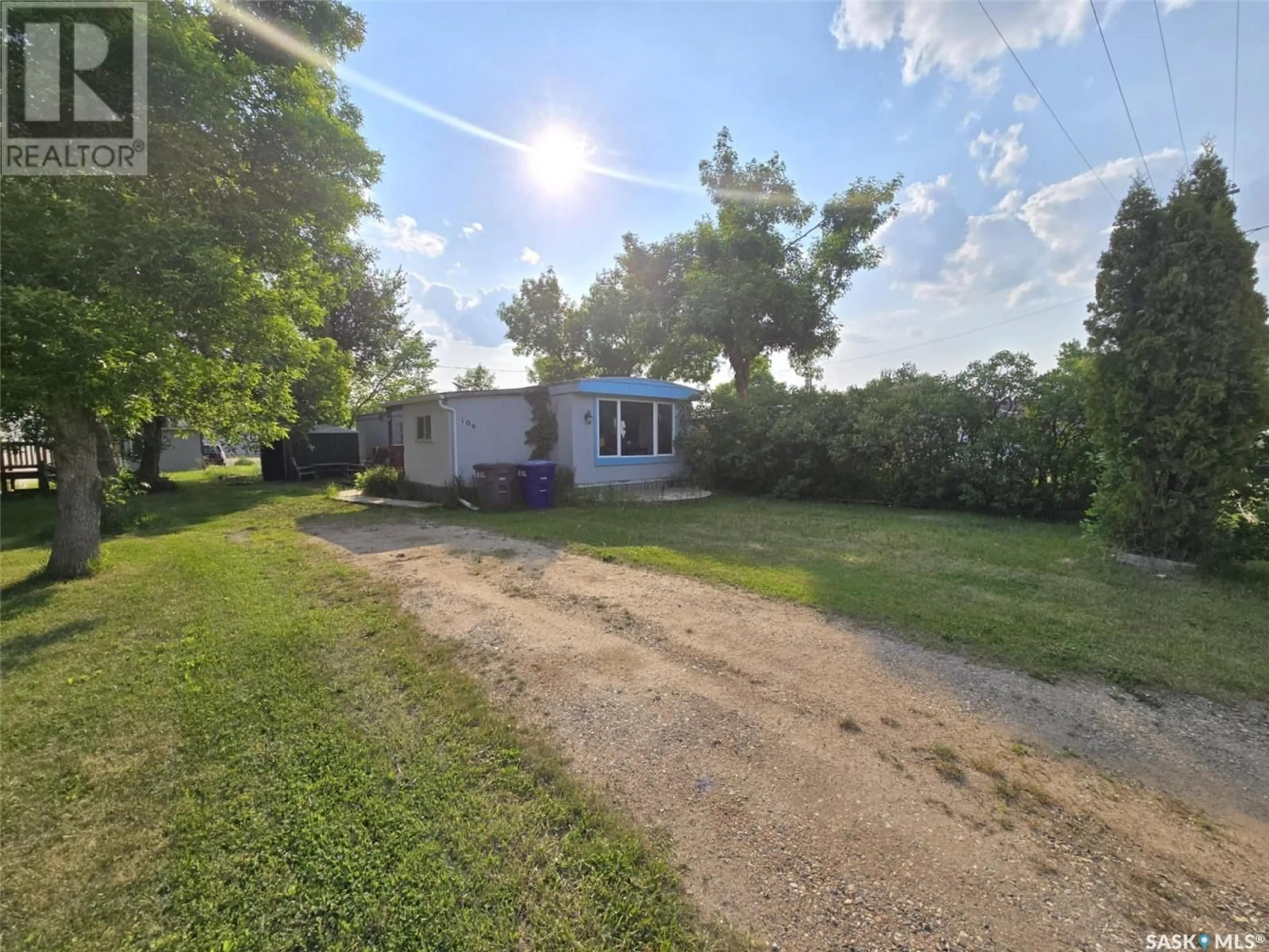 A pic from outside/outdoor area/front of a property/back of a property/a pic from drone, street for 106 LARCH STREET, Caronport Saskatchewan S0H0S0