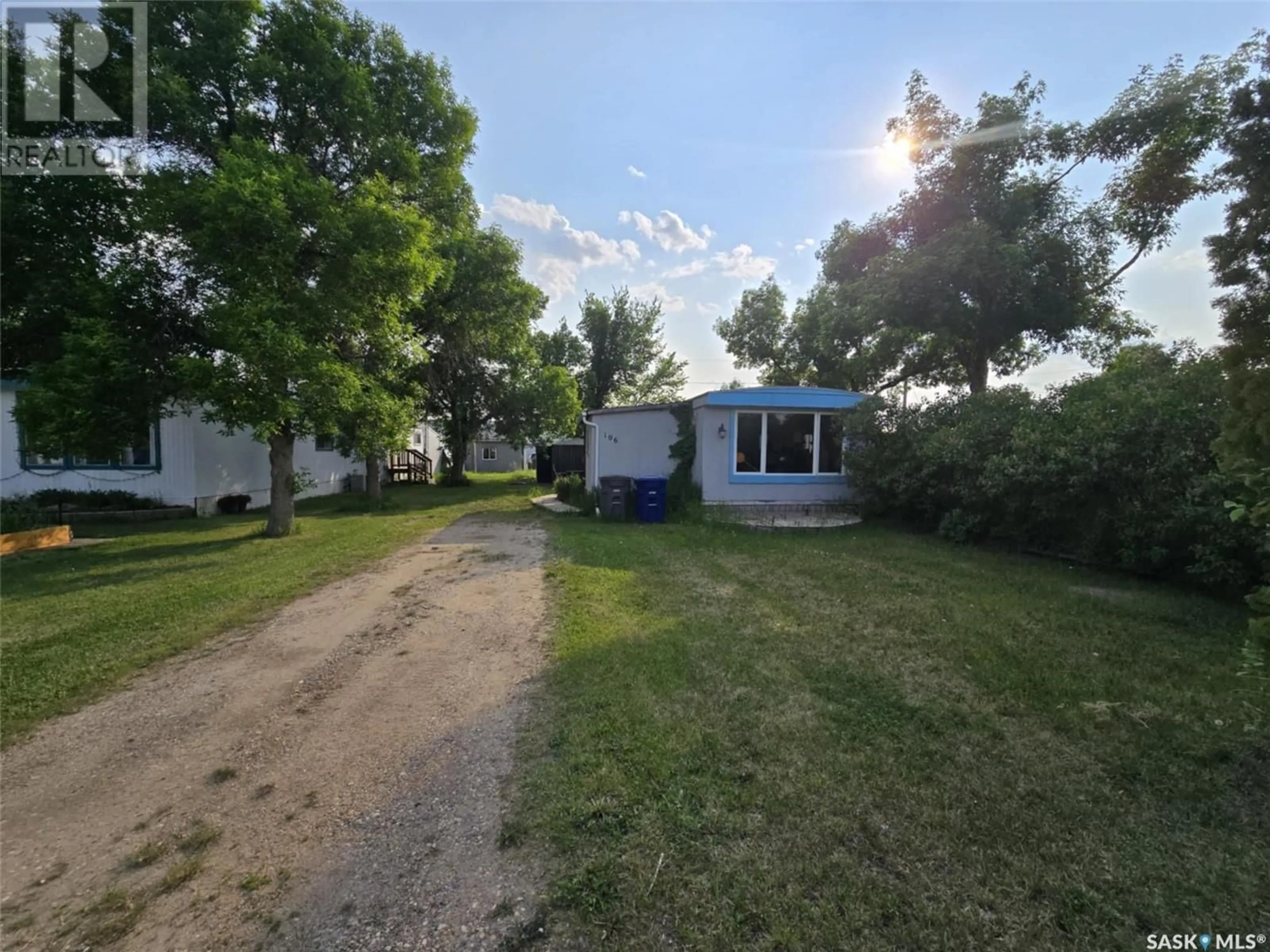 A pic from outside/outdoor area/front of a property/back of a property/a pic from drone, street for 106 LARCH STREET, Caronport Saskatchewan S0H0S0