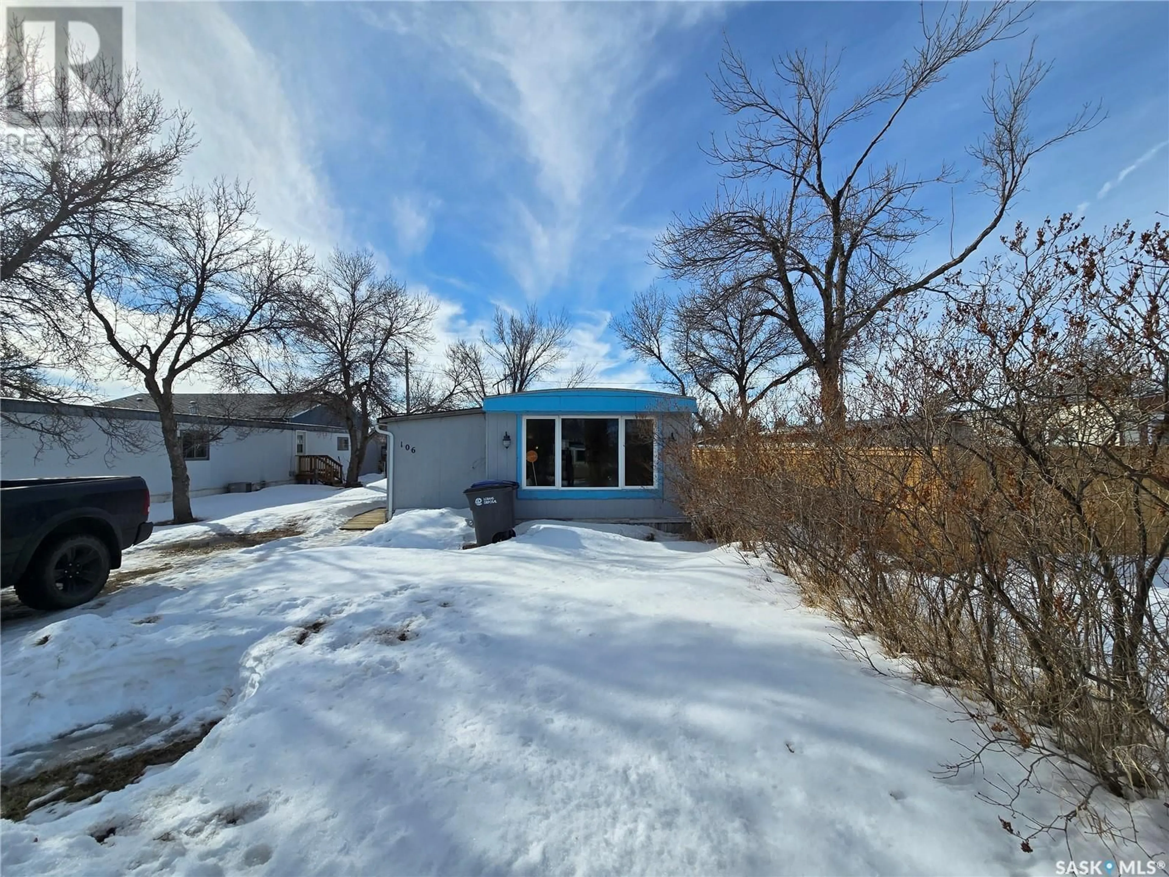 A pic from outside/outdoor area/front of a property/back of a property/a pic from drone, water/lake/river/ocean view for 106 Larch STREET, Caronport Saskatchewan S0H0S0