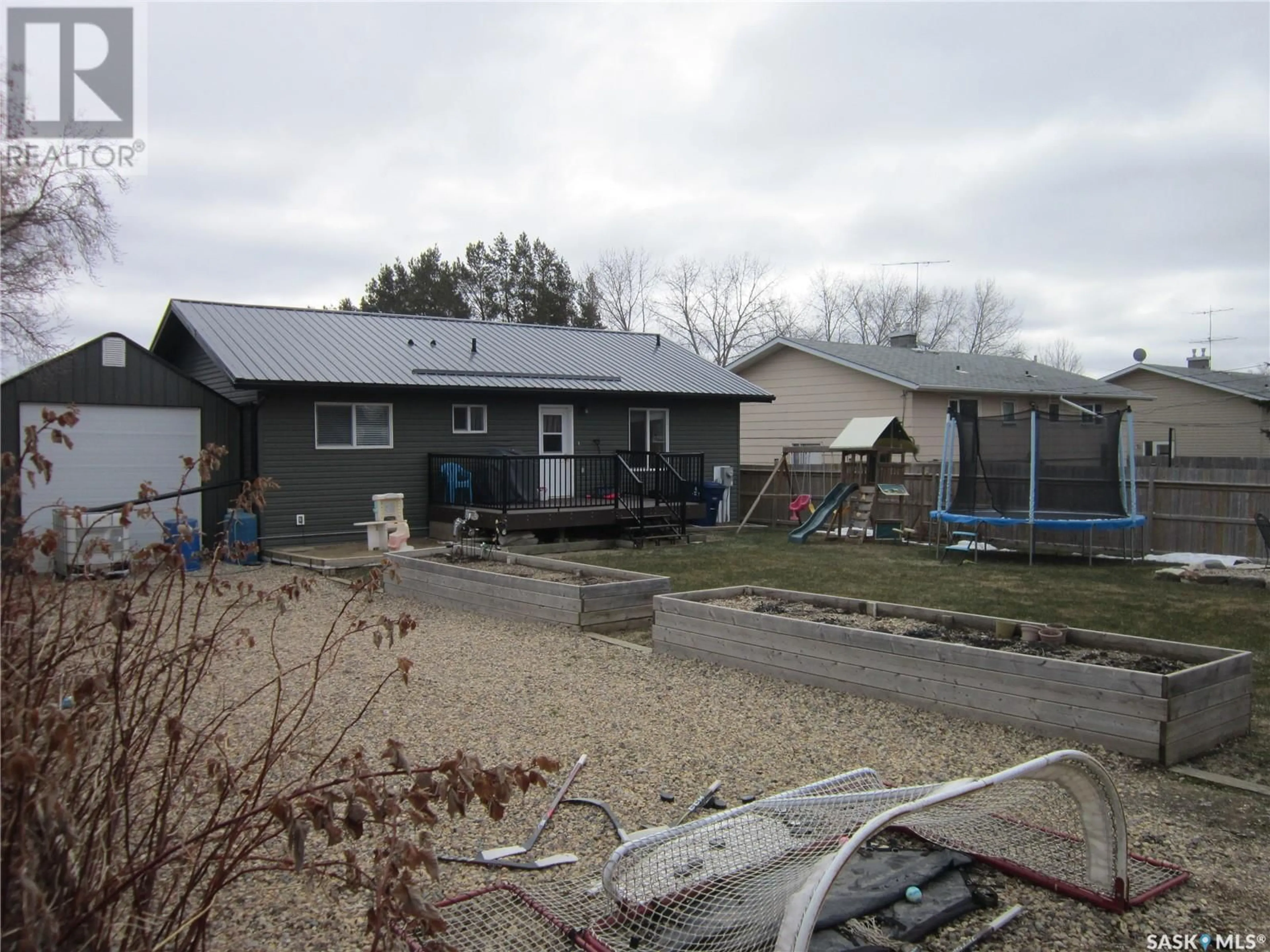 A pic from outside/outdoor area/front of a property/back of a property/a pic from drone, unknown for 335 RUTTLE AVENUE, Kinistino Saskatchewan S0J1H0