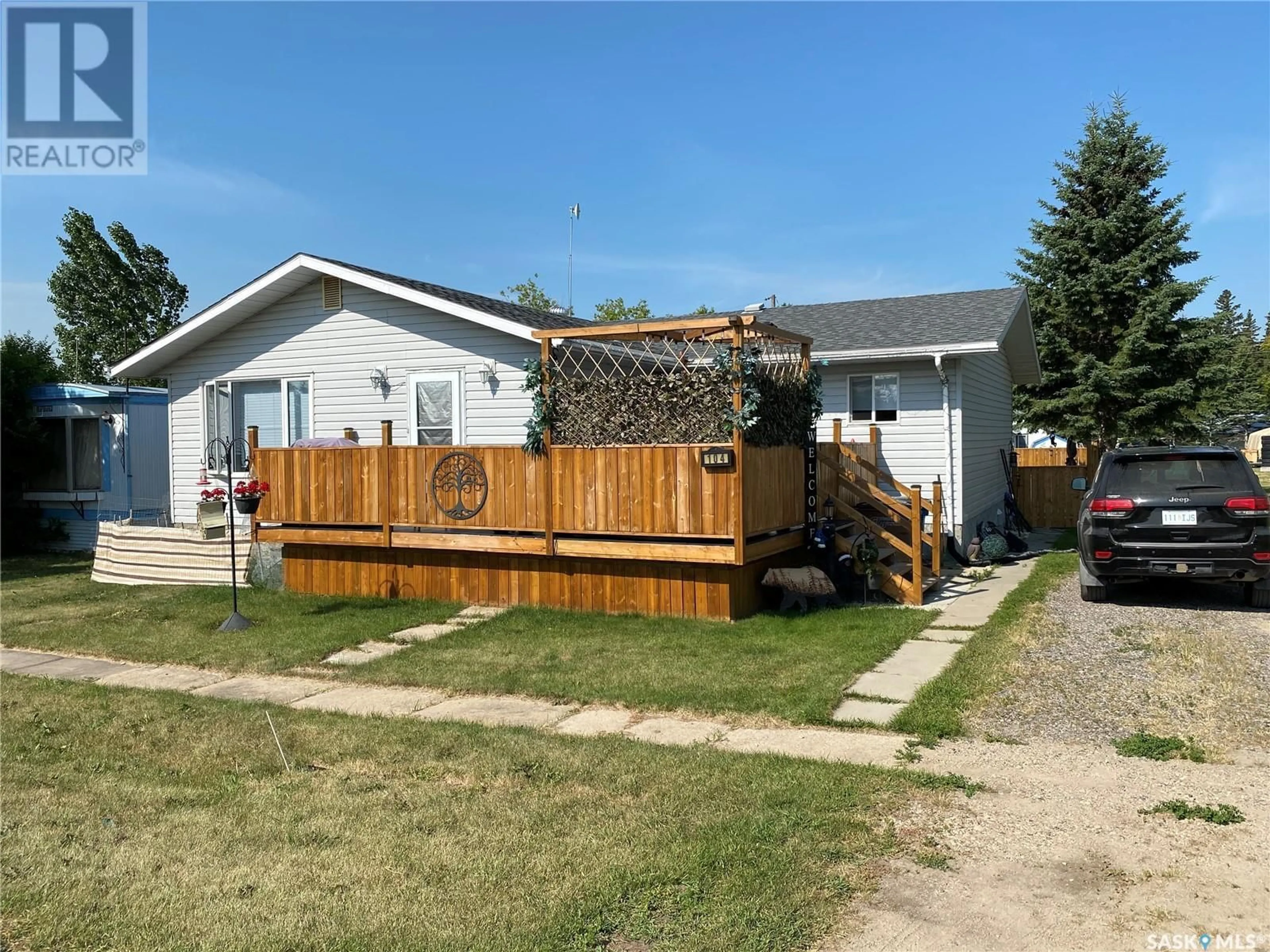 A pic from outside/outdoor area/front of a property/back of a property/a pic from drone, street for 104 1st STREET E, Weirdale Saskatchewan S0J2Z0