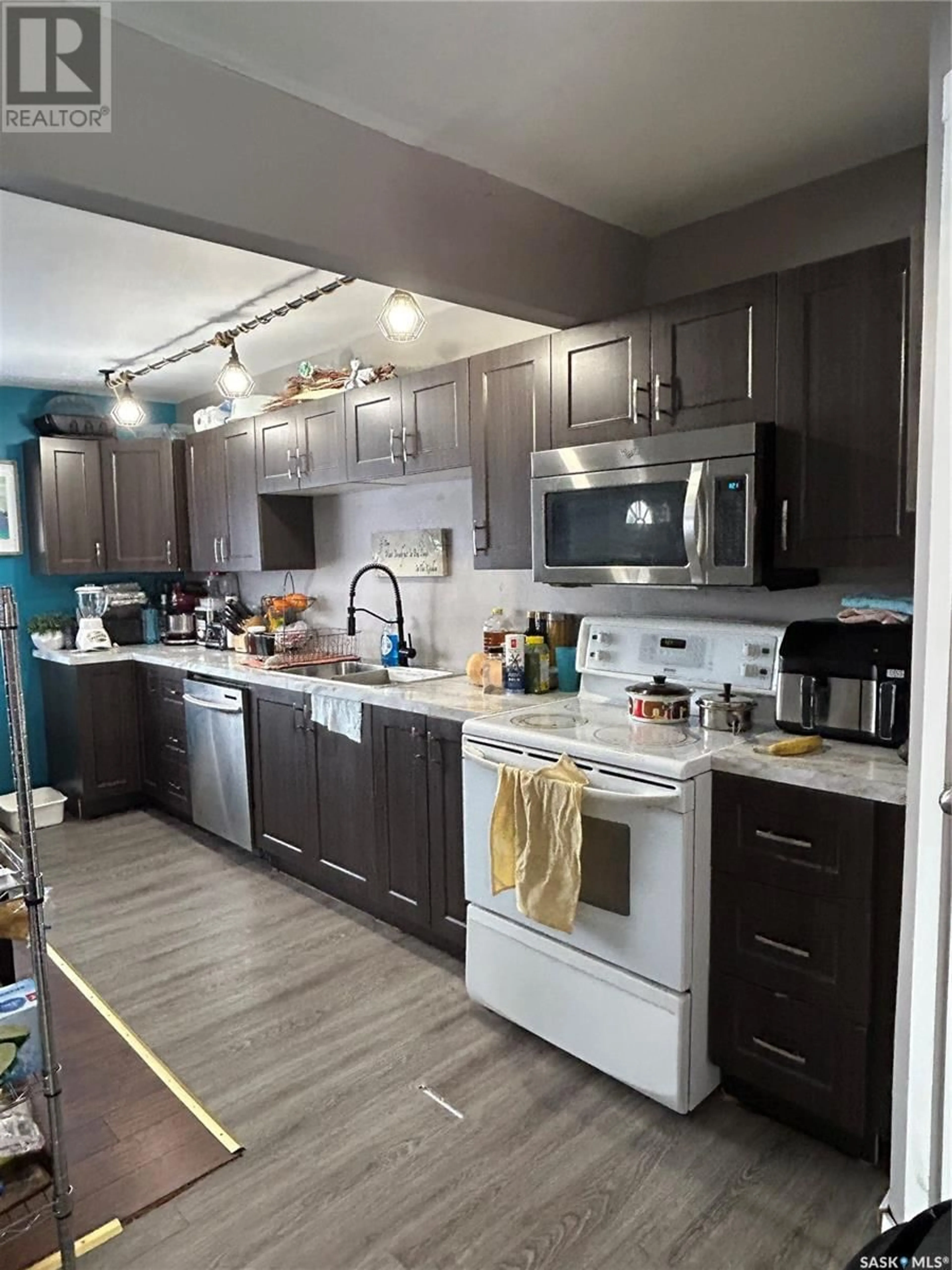Open concept kitchen, unknown for 810 EVA STREET, Estevan Saskatchewan S4A1P3
