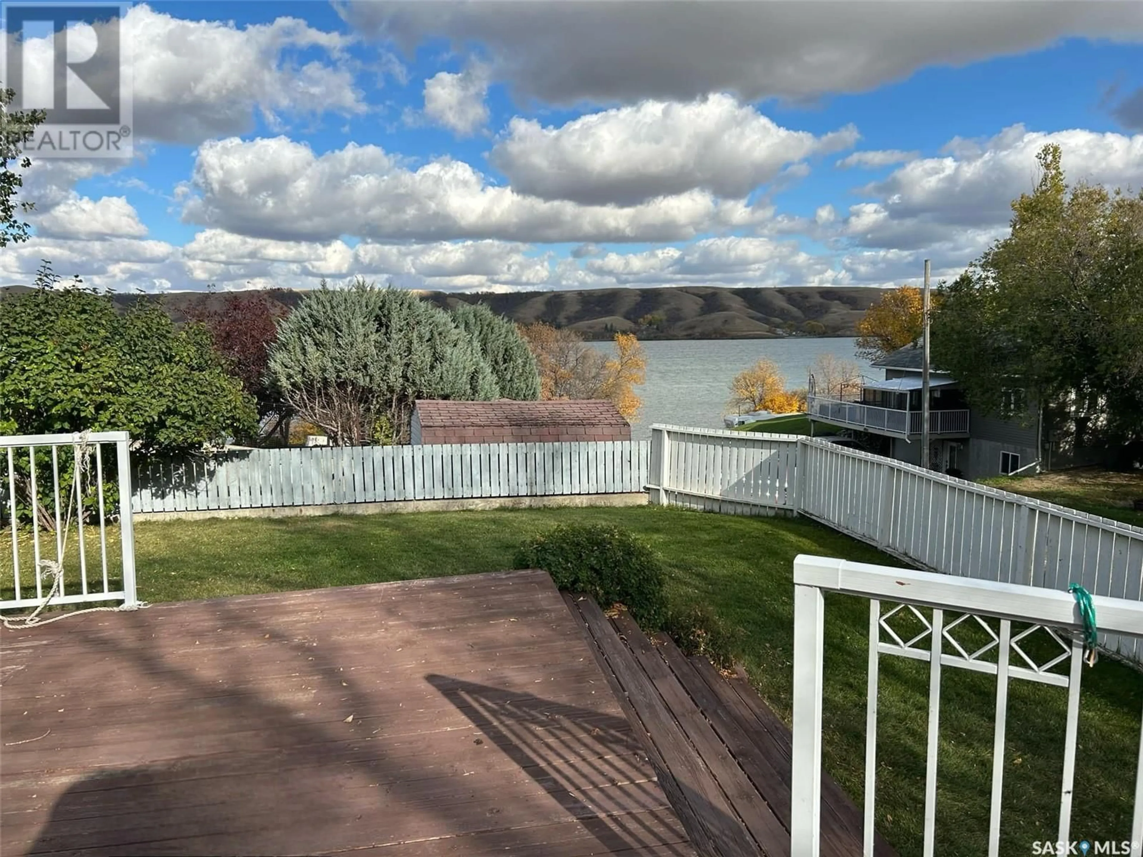 A pic from outside/outdoor area/front of a property/back of a property/a pic from drone, water/lake/river/ocean view for 114 MARINE DRIVE, South Lake Saskatchewan S0H2X0