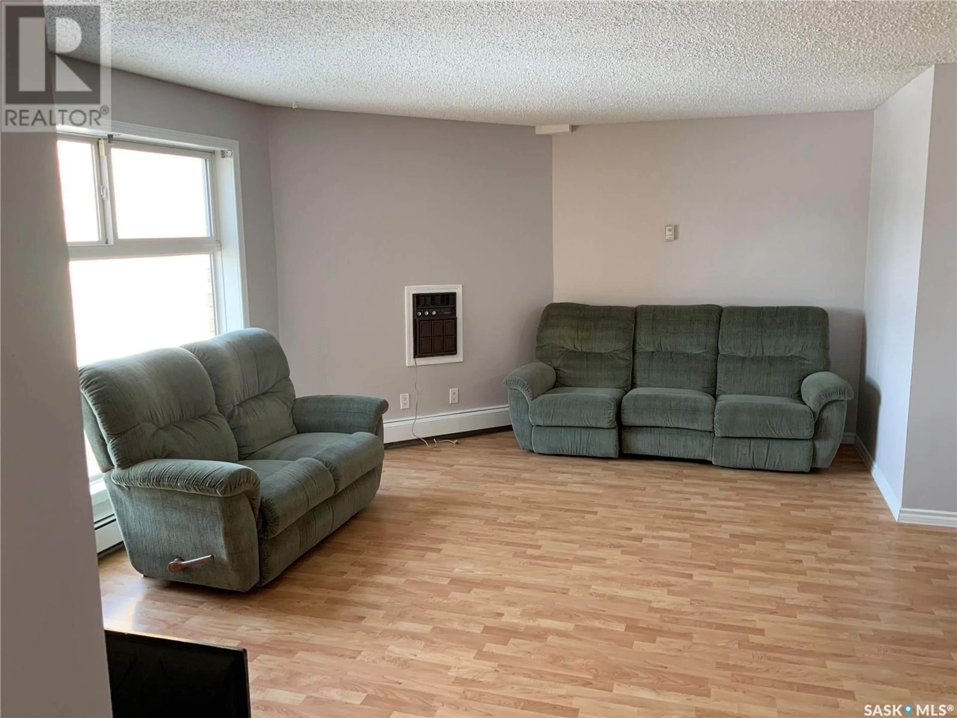 Living room with furniture, unknown for 300 415 Tait COURT, Saskatoon Saskatchewan S7H5L3